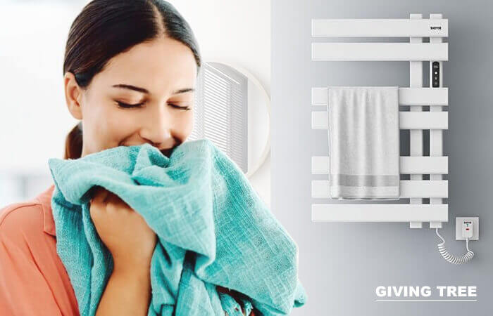 A girl is smelling the towel after drying