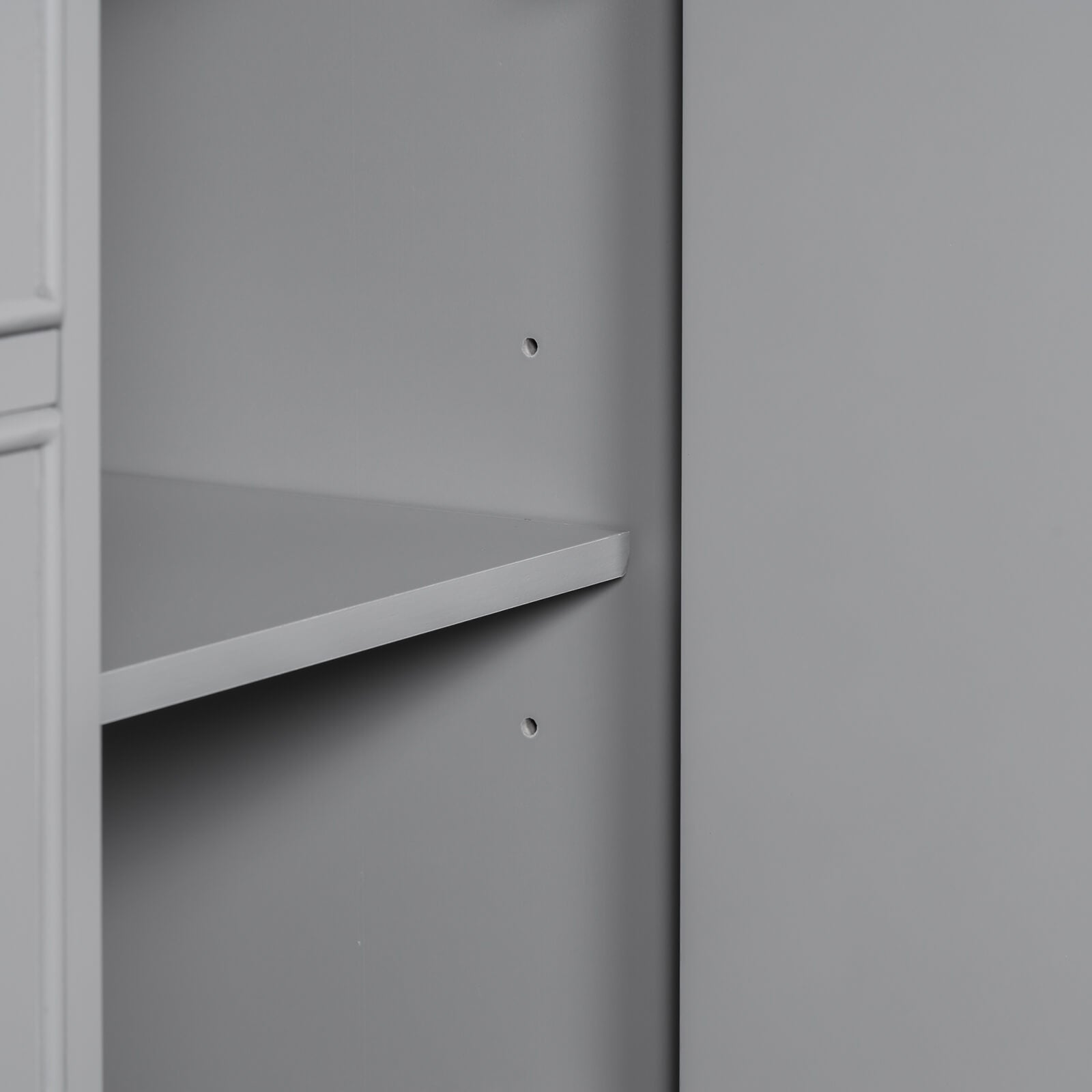 Adjustable baffle detail on 36 inch grey bathroom vanity cabinet with hair dryer storage