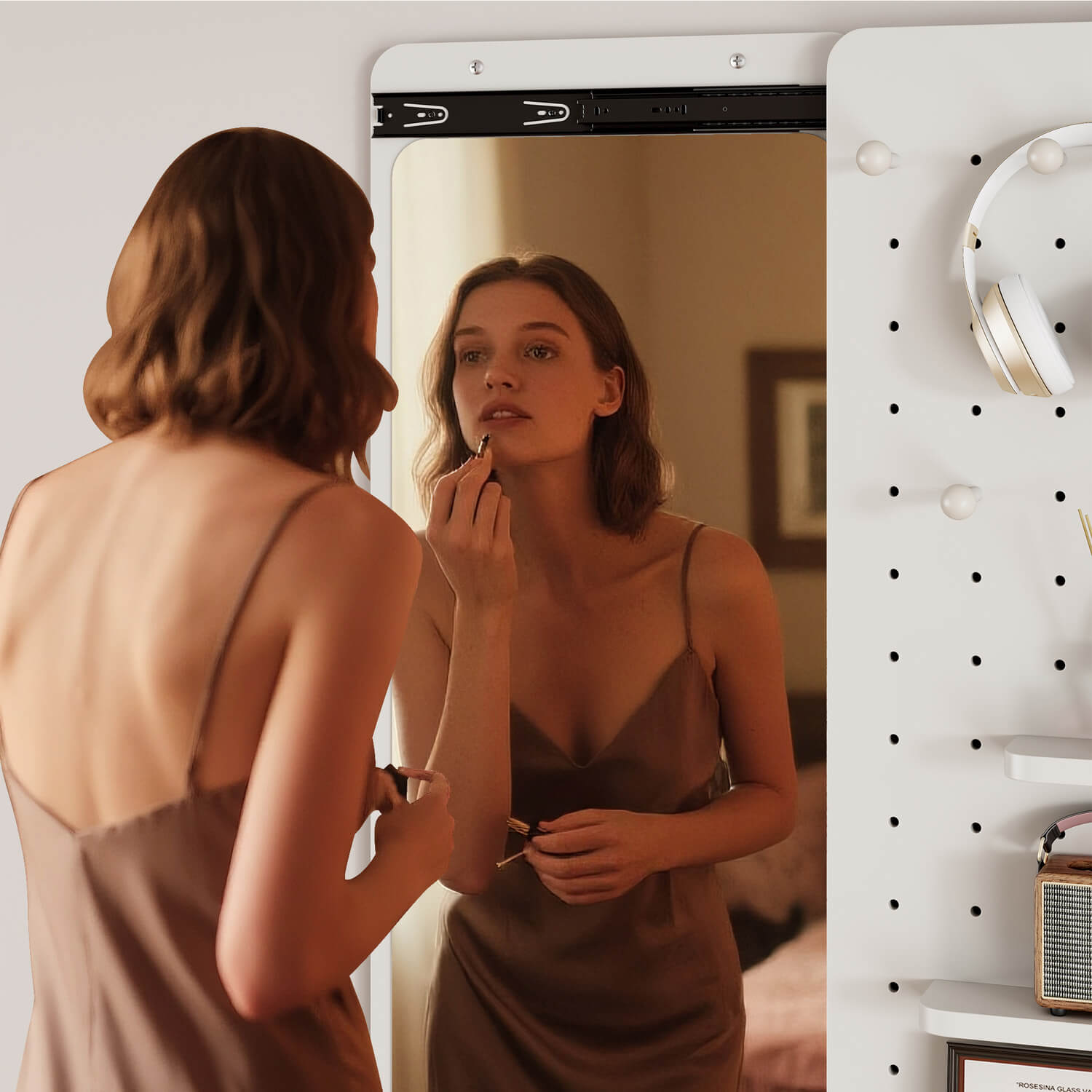 Bedroom vanity mirror with sliding pegboard for makeup essentials storage