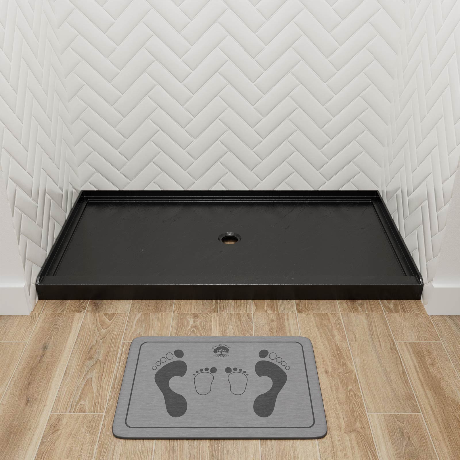 Black shower base with anti slip pattern and tapered floor design