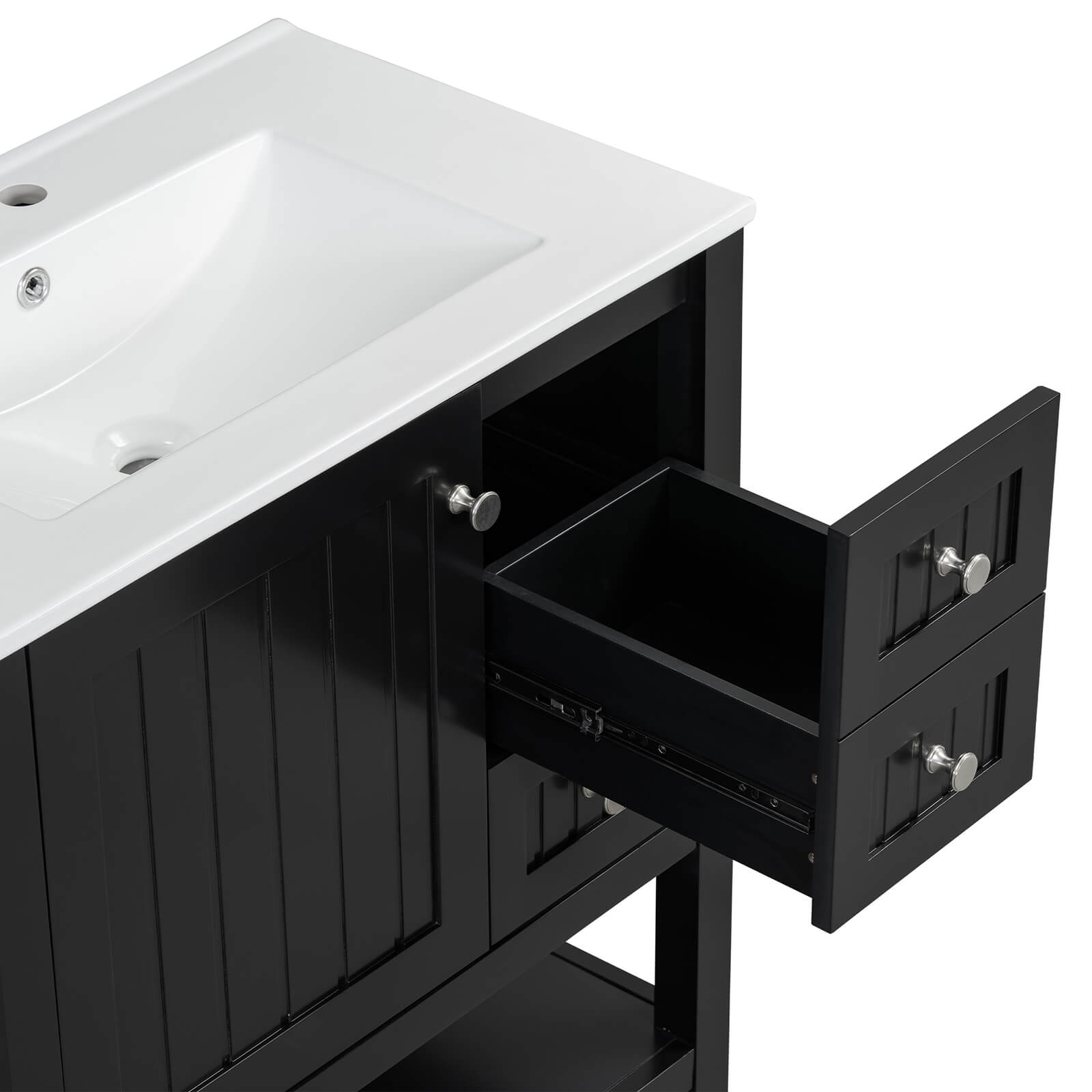 Black freestanding bathroom vanity in a modern bathroom renovation