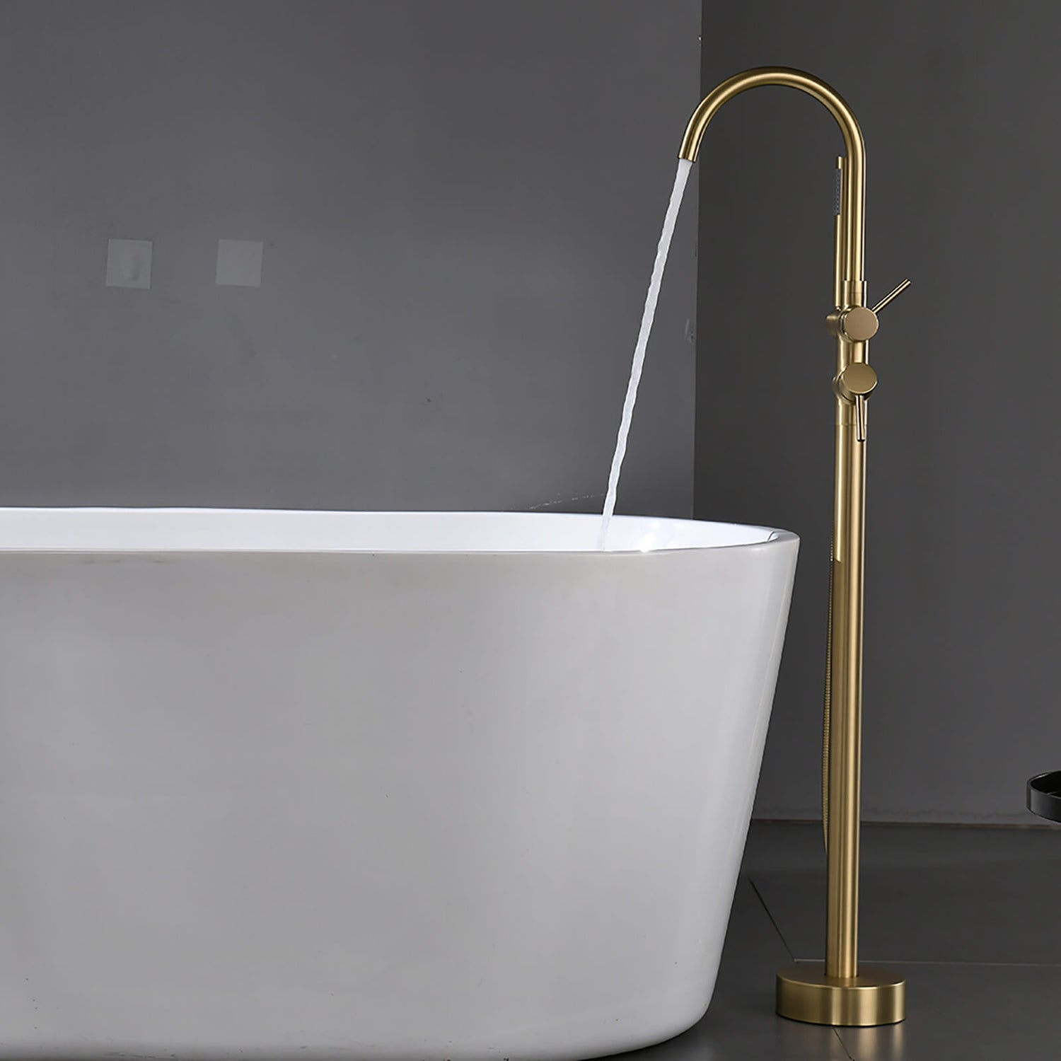 Brushed gold freestanding tub faucet with hand shower