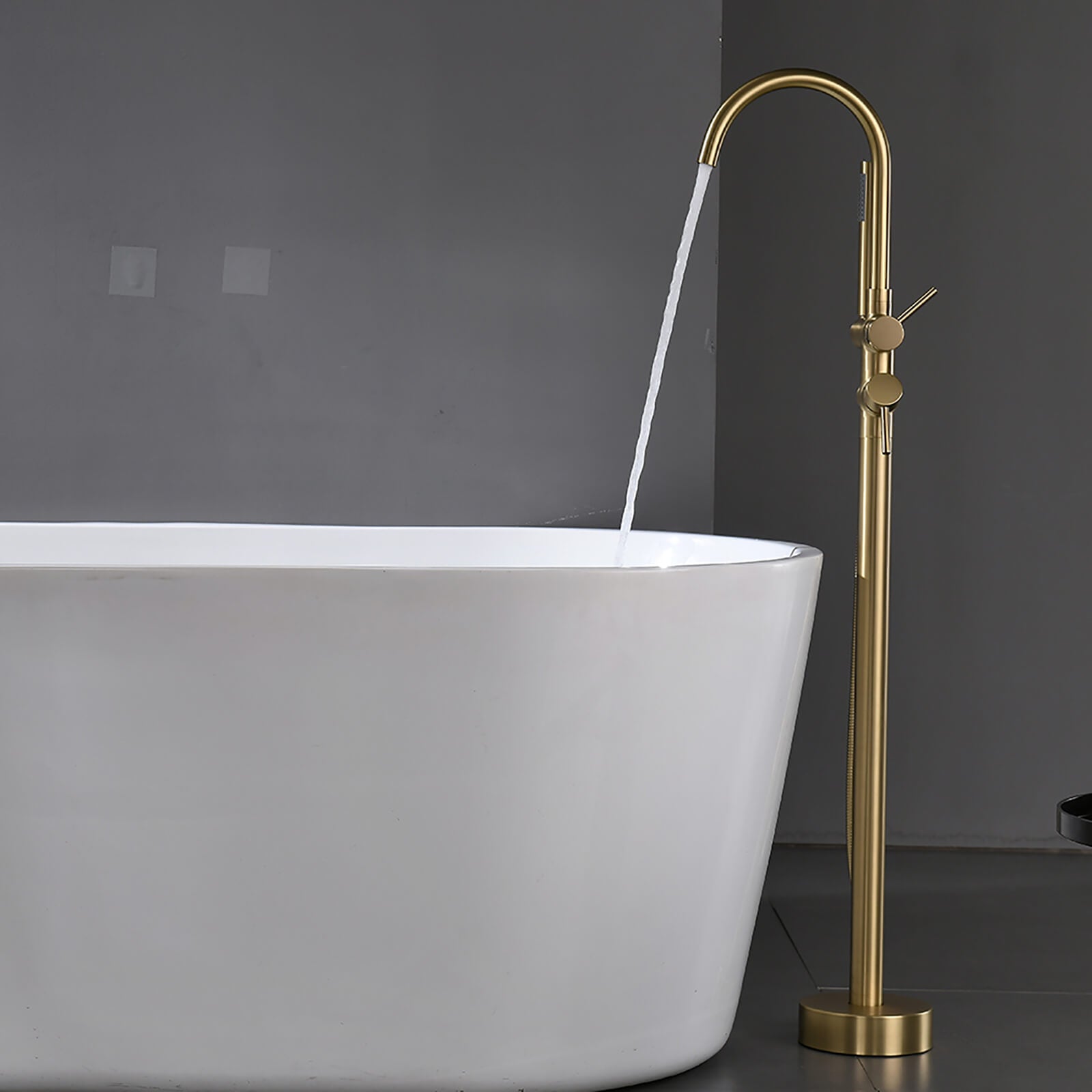 Brushed gold freestanding tub faucet with hand shower