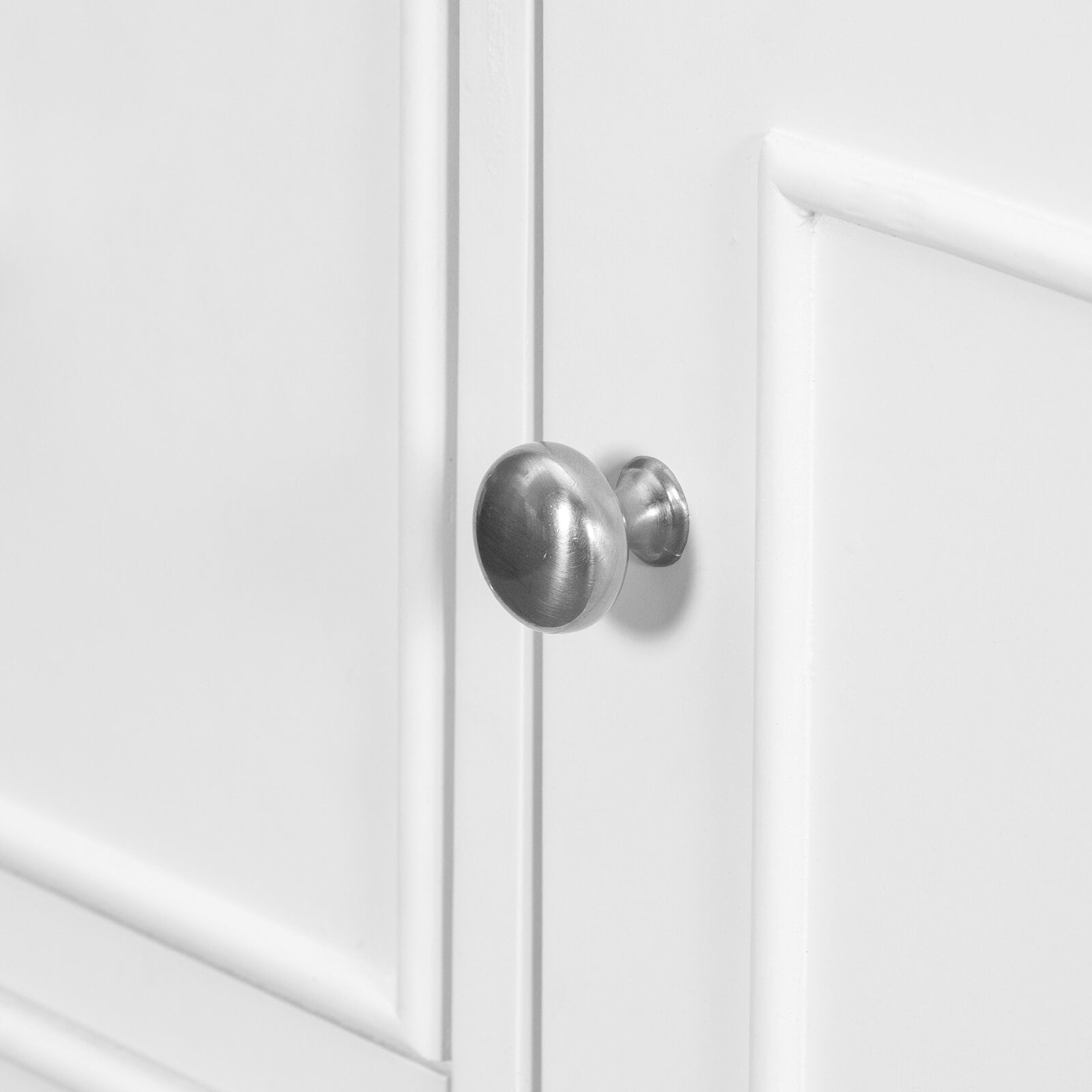 Close-up of brass handle details on a sleek white bathroom vanity Cabinet Only