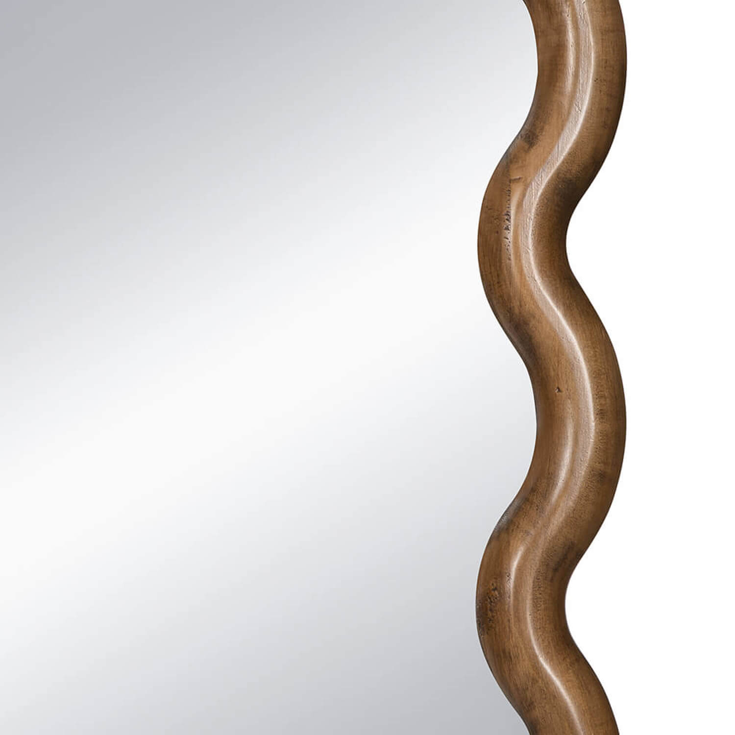 Close up of handcrafted scalloped wooden mirror frame texture