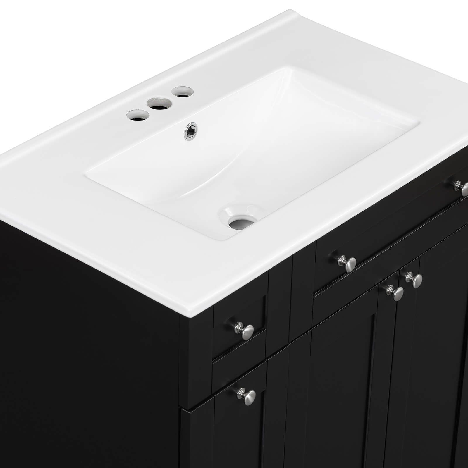 Detail of a 30 inch black bathroom vanity sink with soft close door design