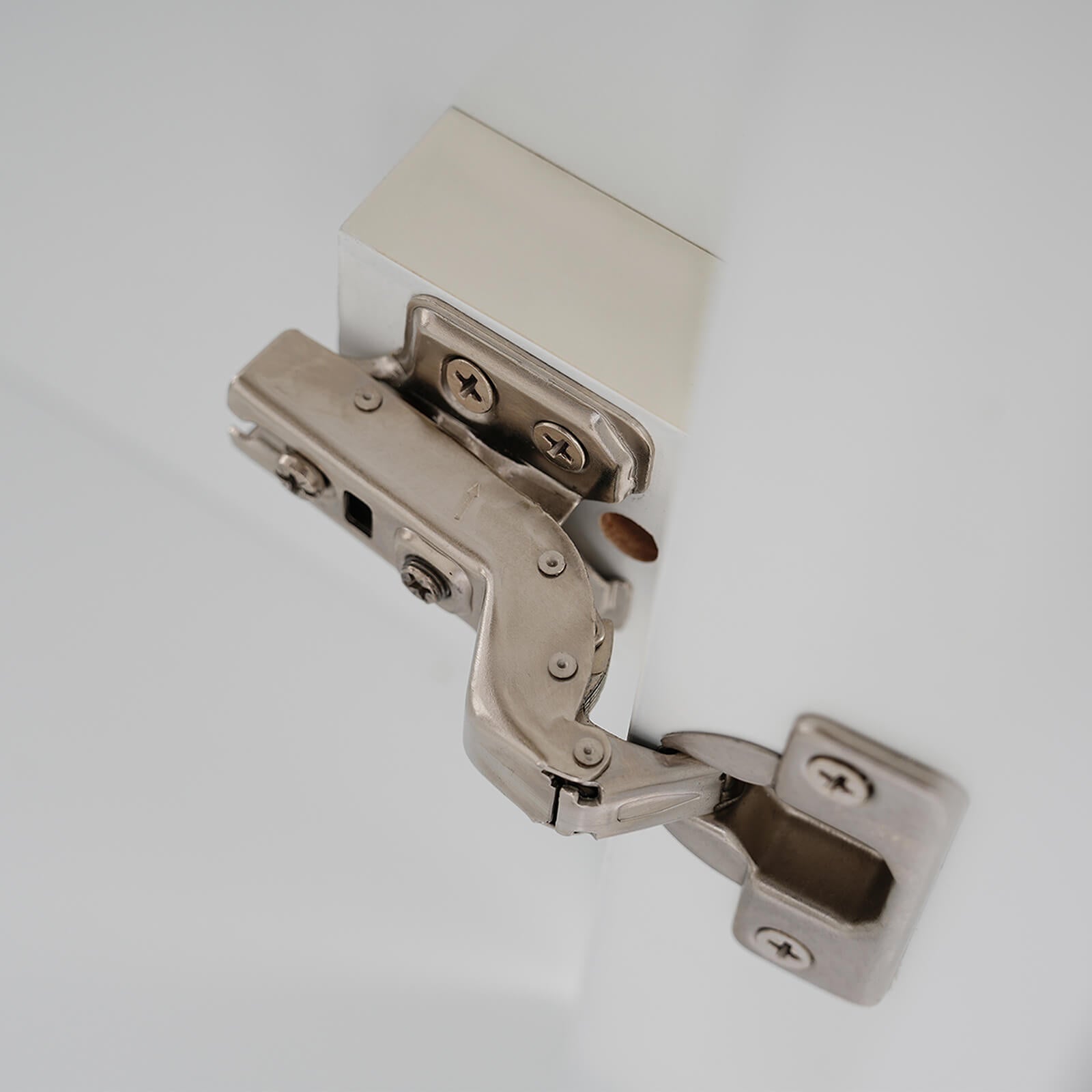 Detail of hinges on 20 inch white single door bathroom vanity