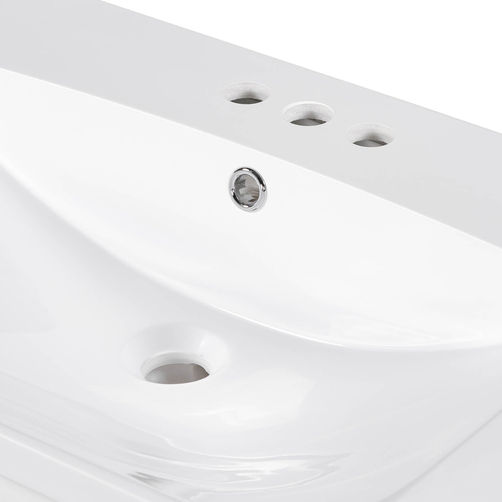 Detail of top sink in 30 inch white bathroom vanity with soft close door