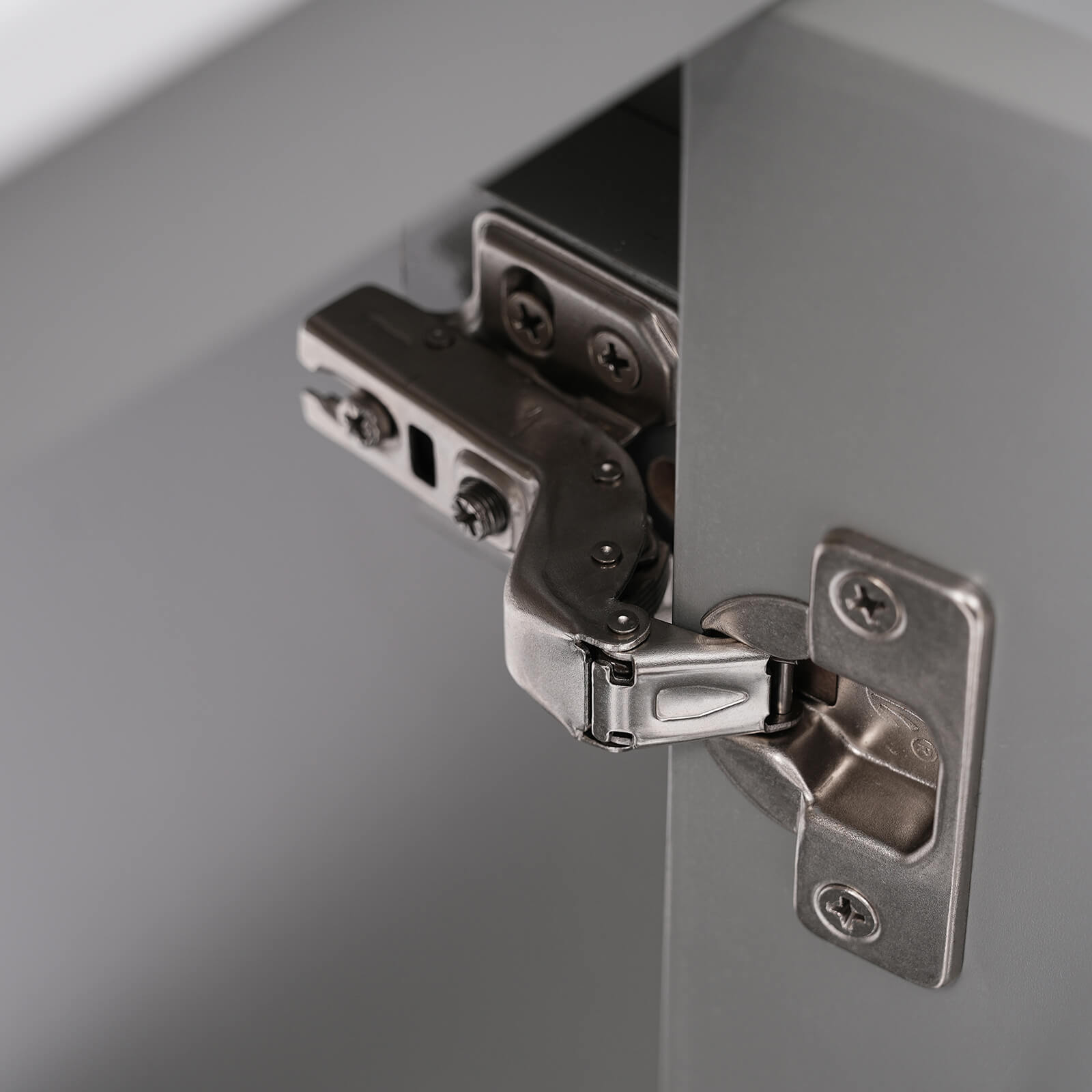 Hinge detail display of a 20 inch grey single door bathroom vanity