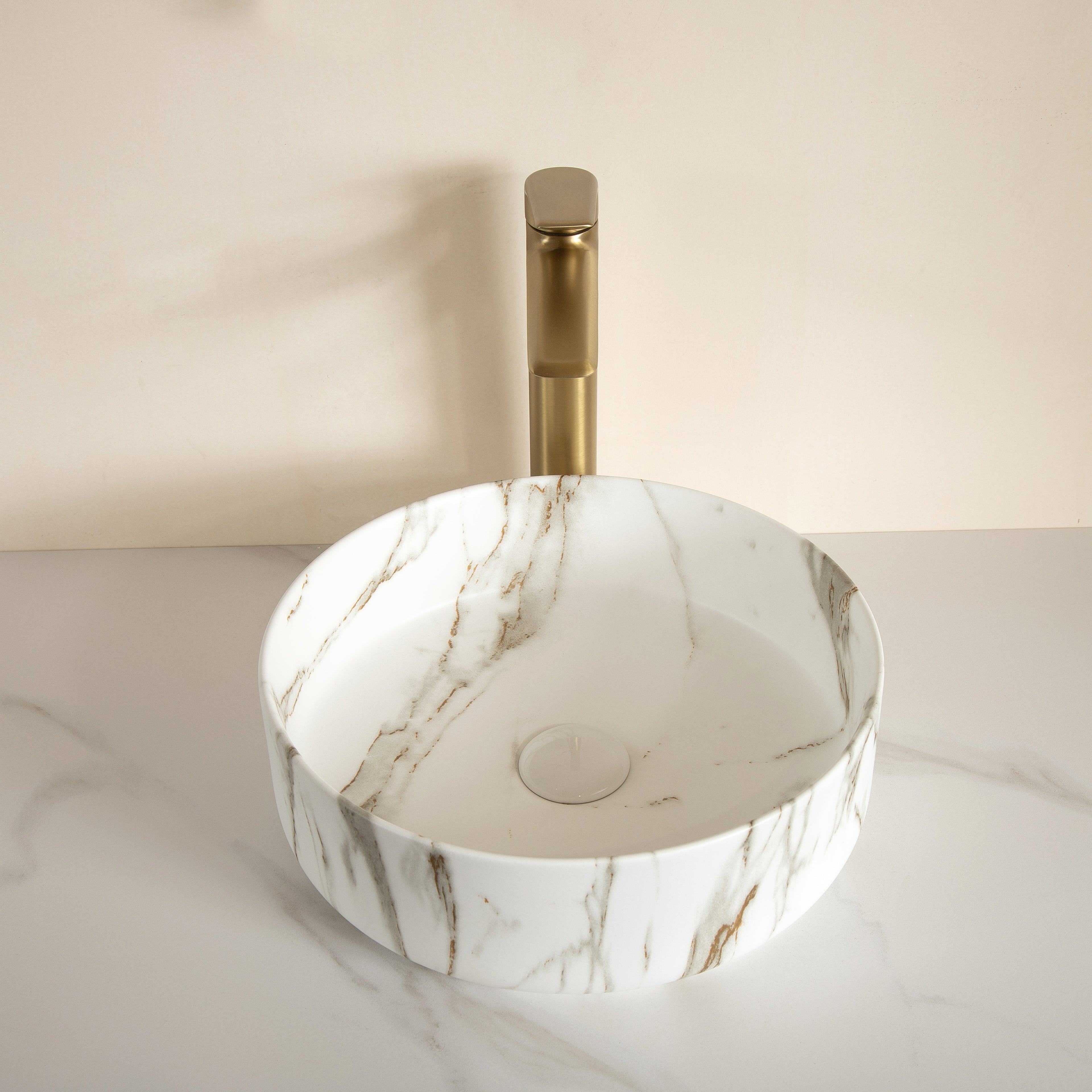 White Ceramic Round Above-Counter Vessel Sink with Stone Pattern oblique view stone-patterned interior drain hole
