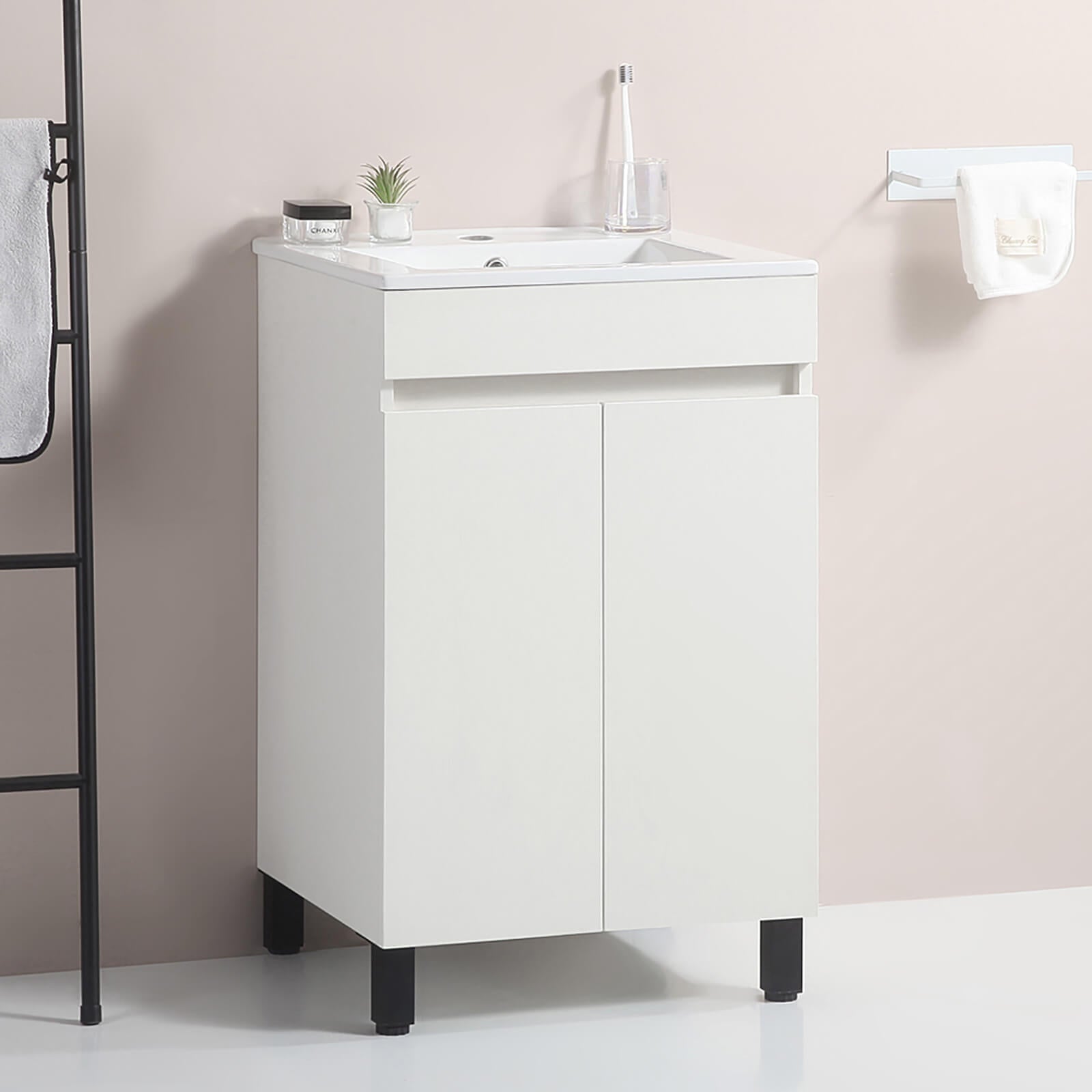 Minimalist white bathroom cabinet with black legs