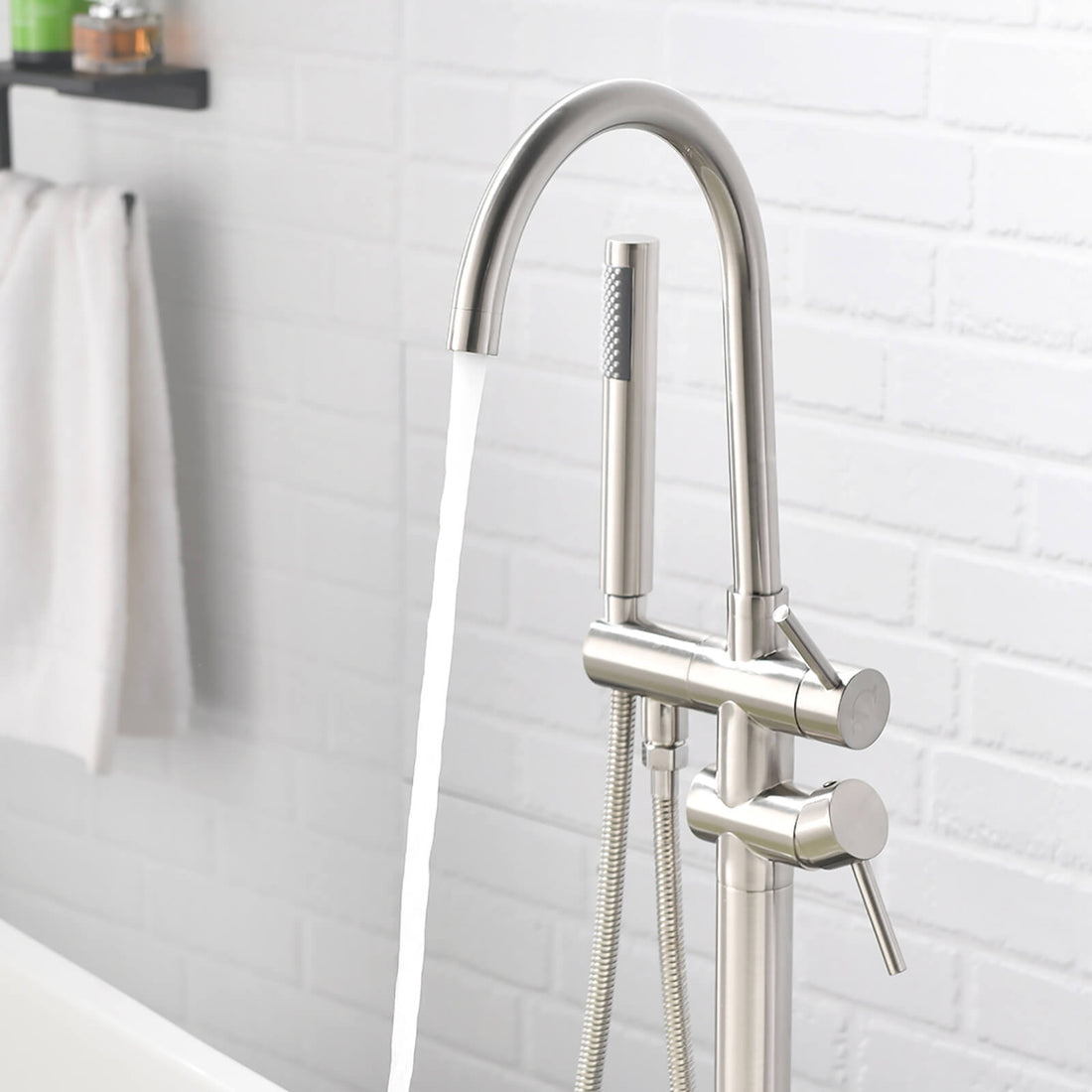 Modern brushed nickel floor mounted bathtub faucet