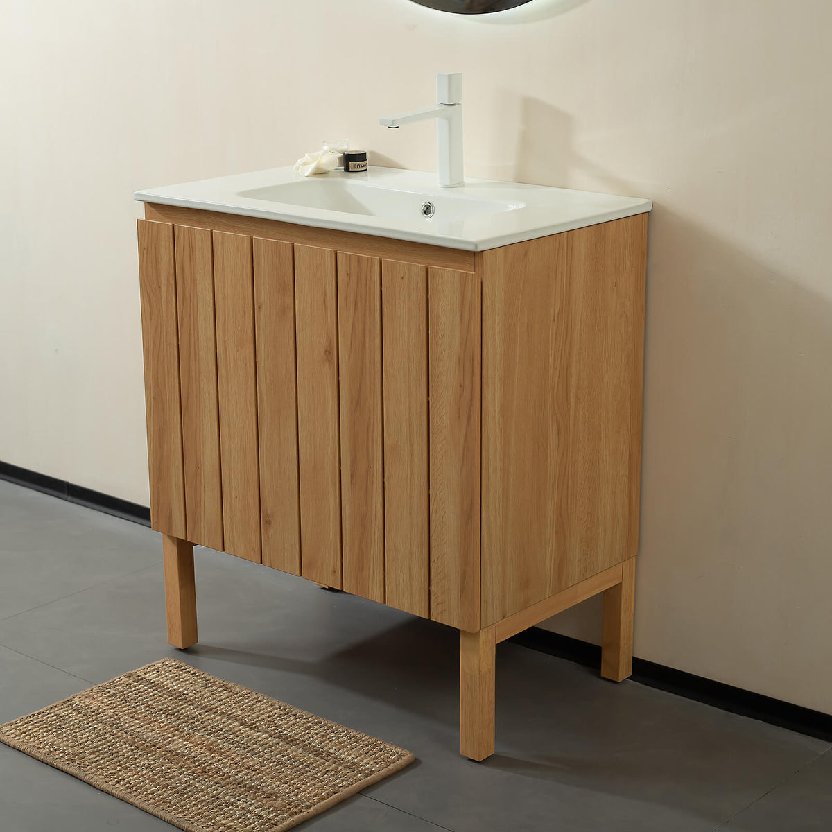 Scandinavian style bathroom vanity with vertical slatted front