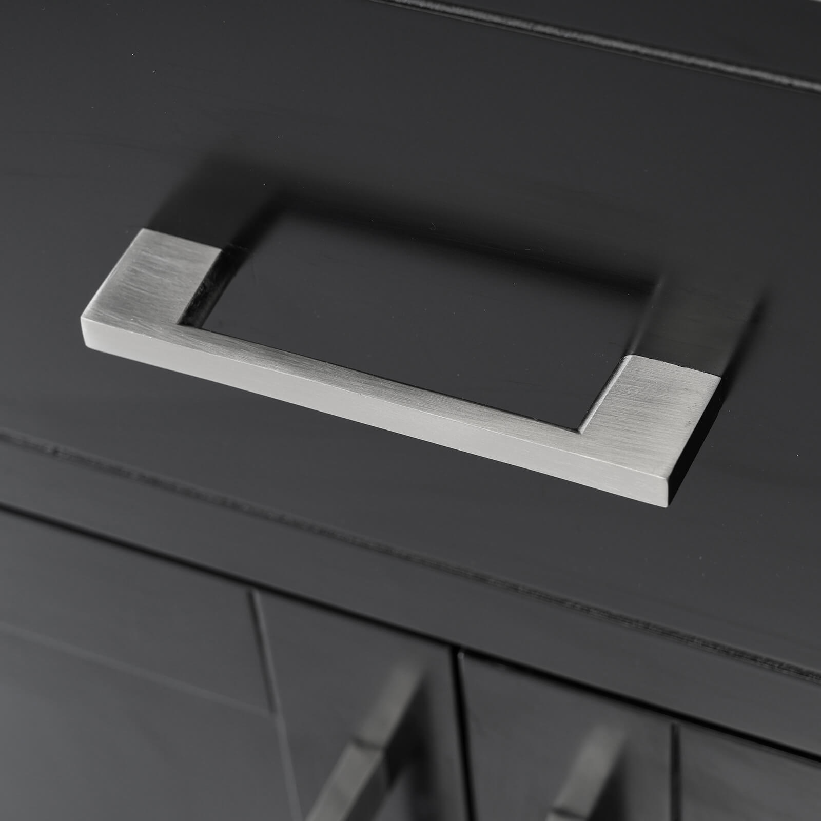 Silver handle detail on 30 inch modern black silk finish freestanding vanity