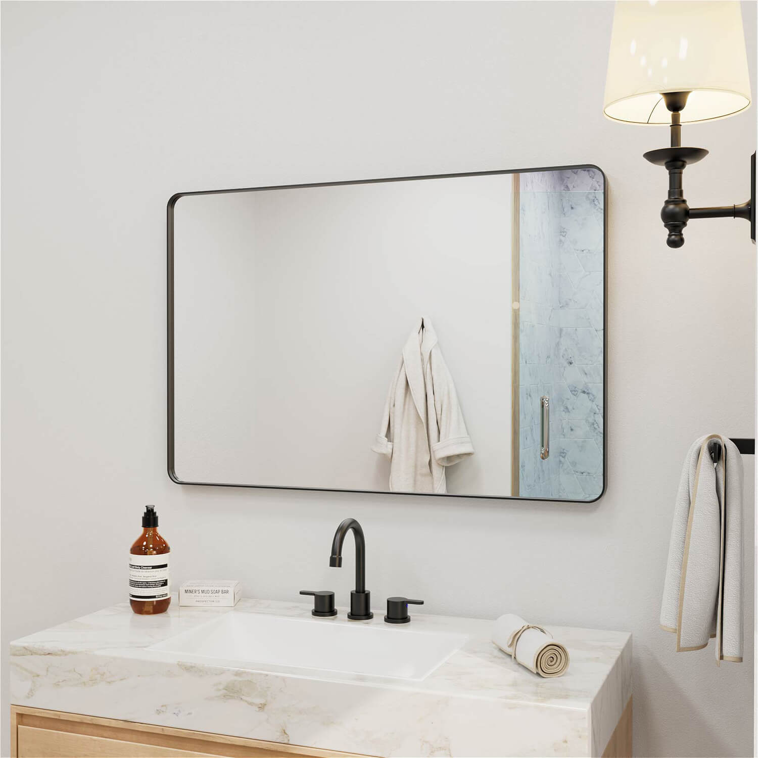 Slim black framed wide rectangular bathroom mirror with smooth surface