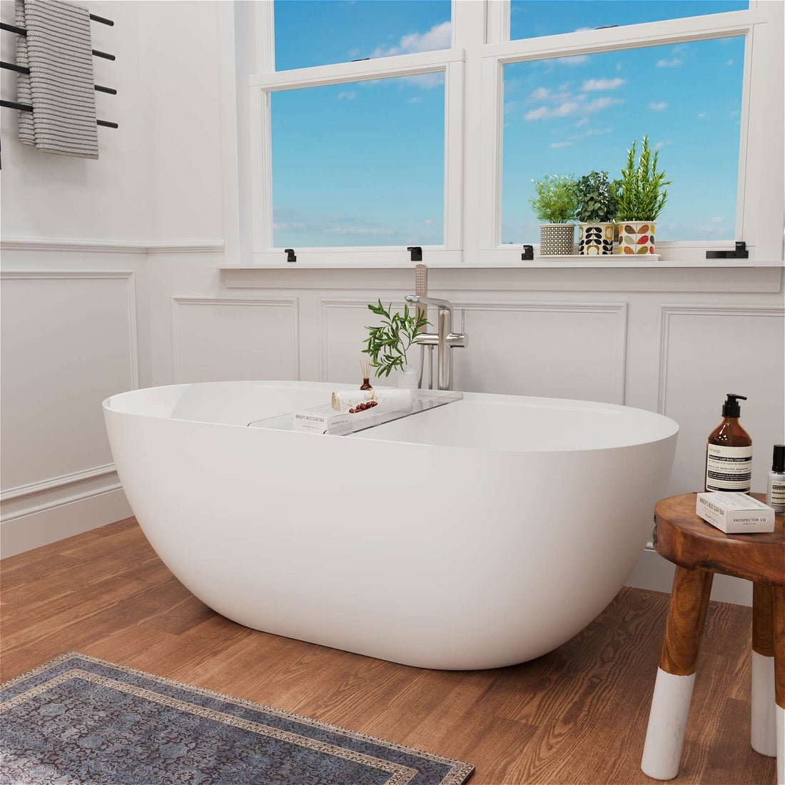 Solid surface oval symmetry tub with ergonomic design