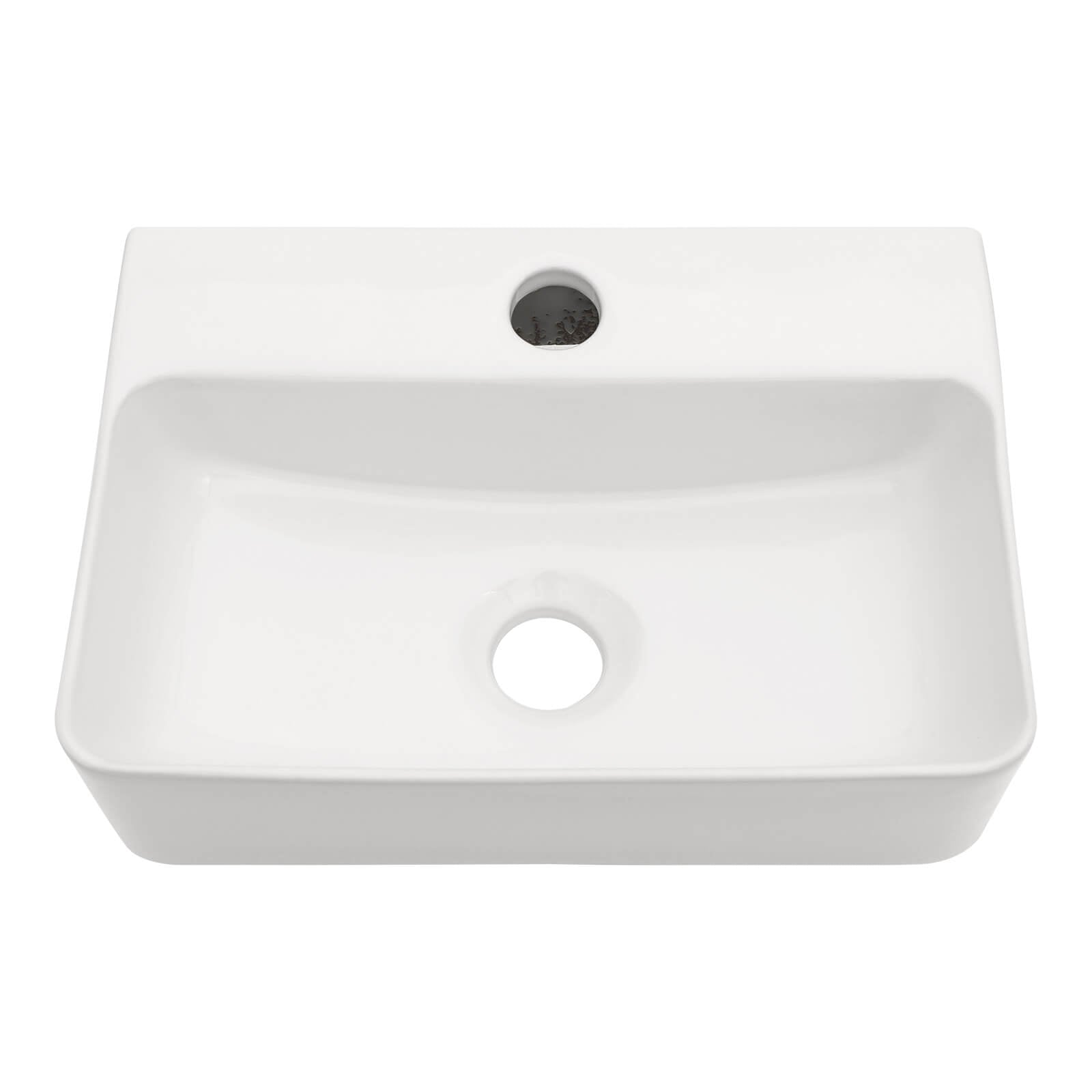 Ultra compact ceramic sink for small bathrooms