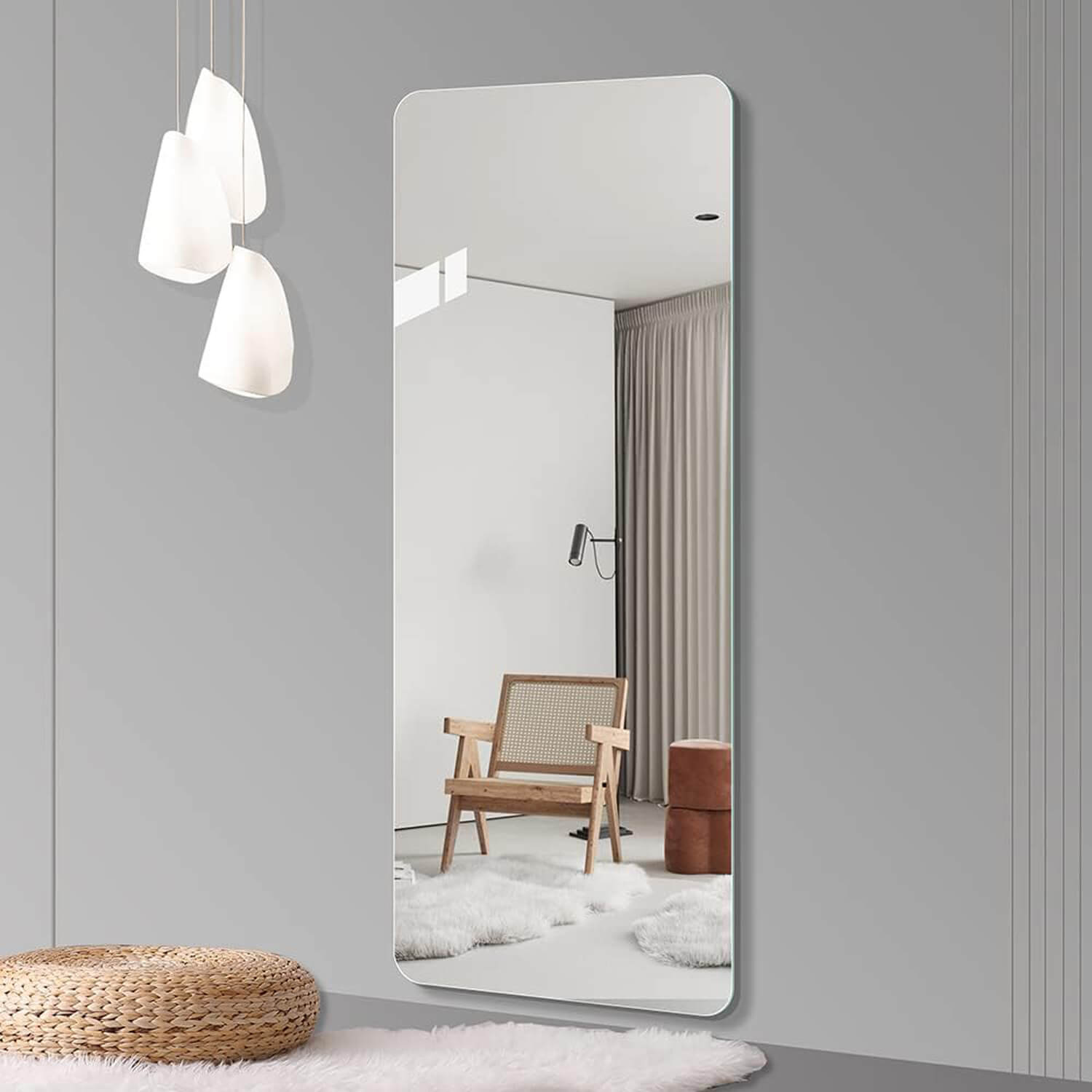 Wall mounted frameless mirror for Scandi modern grey living room
