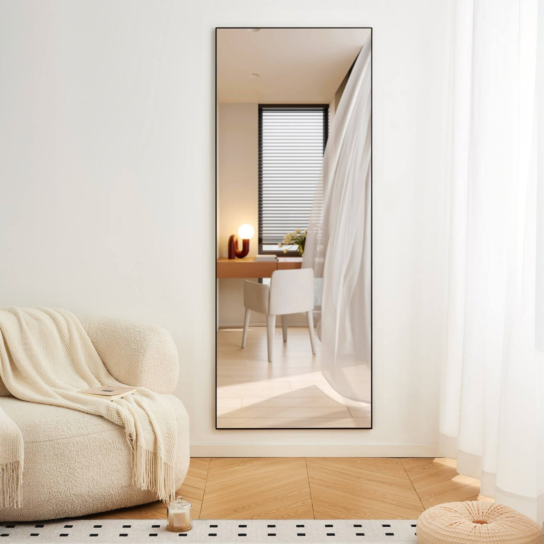 Wall mounted slim black framed full length mirror for minimalist living room