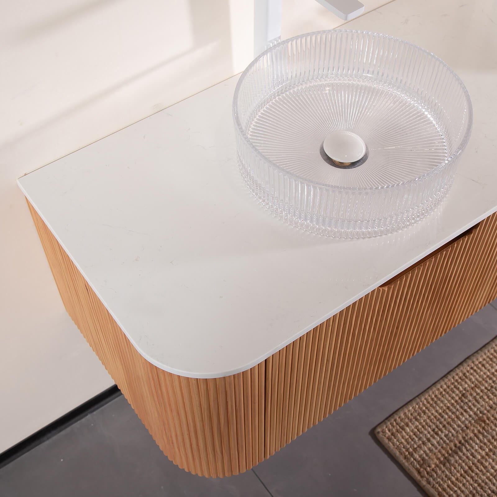 contemporary floating vanity with transparent vessel sinks
