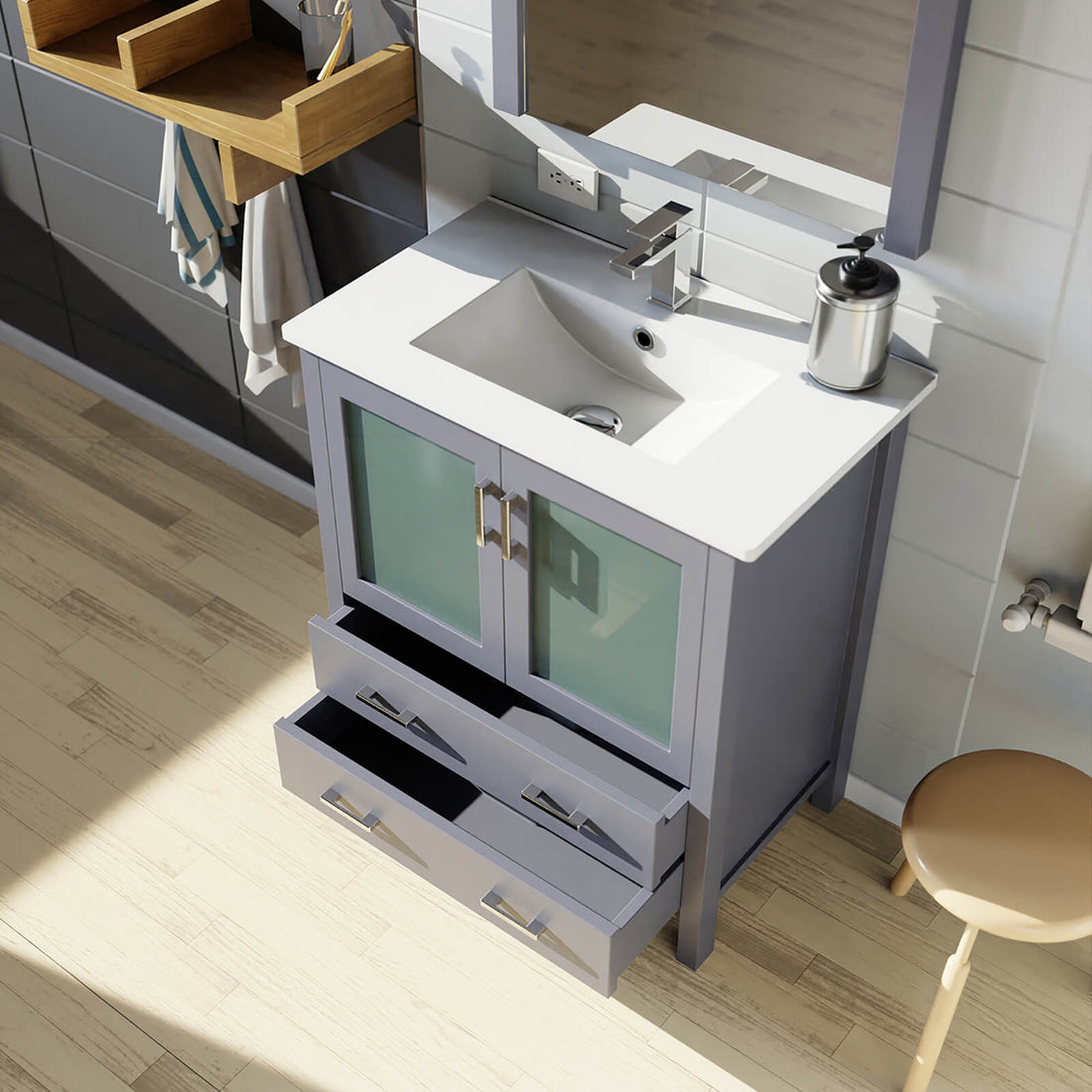 gray bathroom sink cabinet with storage drawers and doors