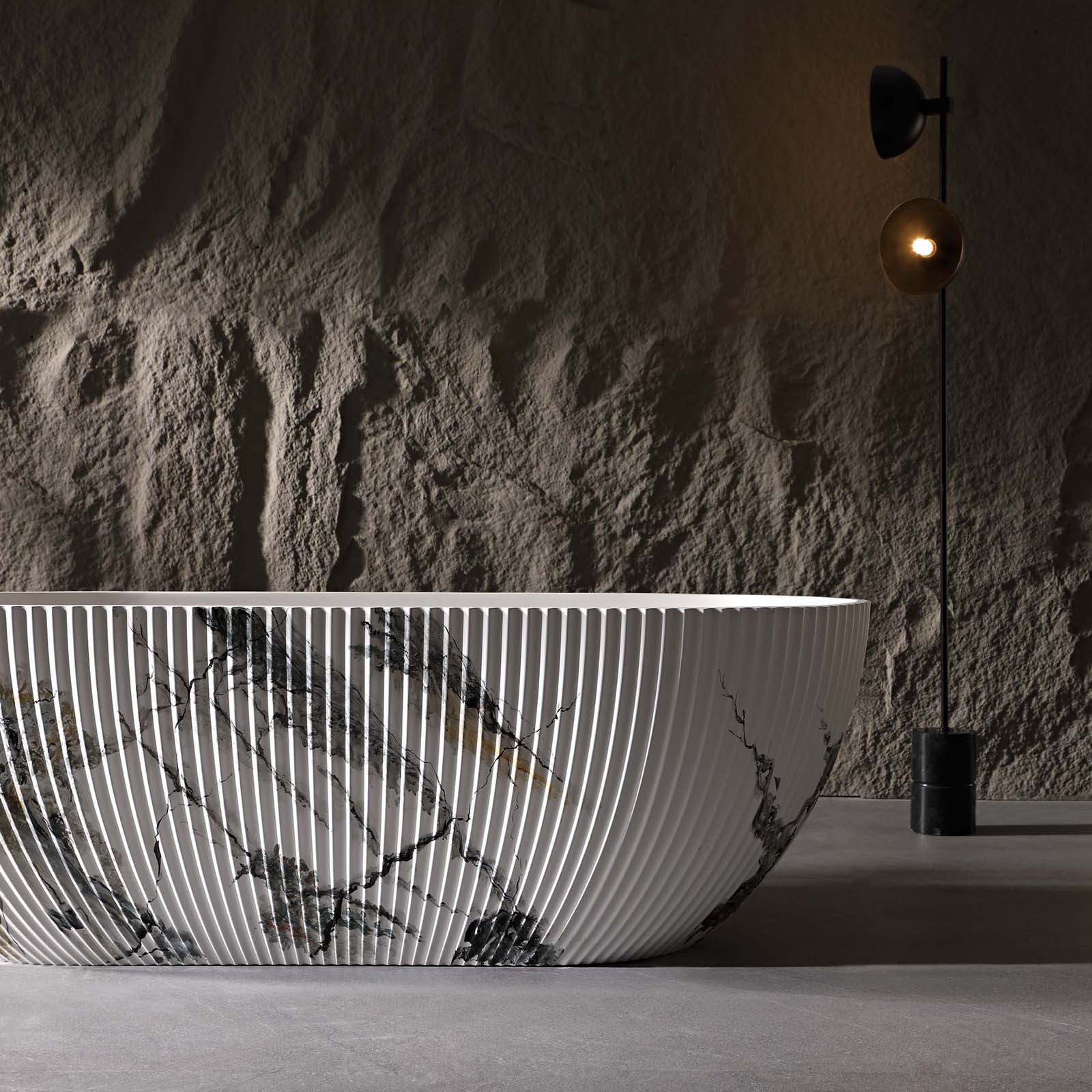 luxury freestanding bathtub with ink marble veining