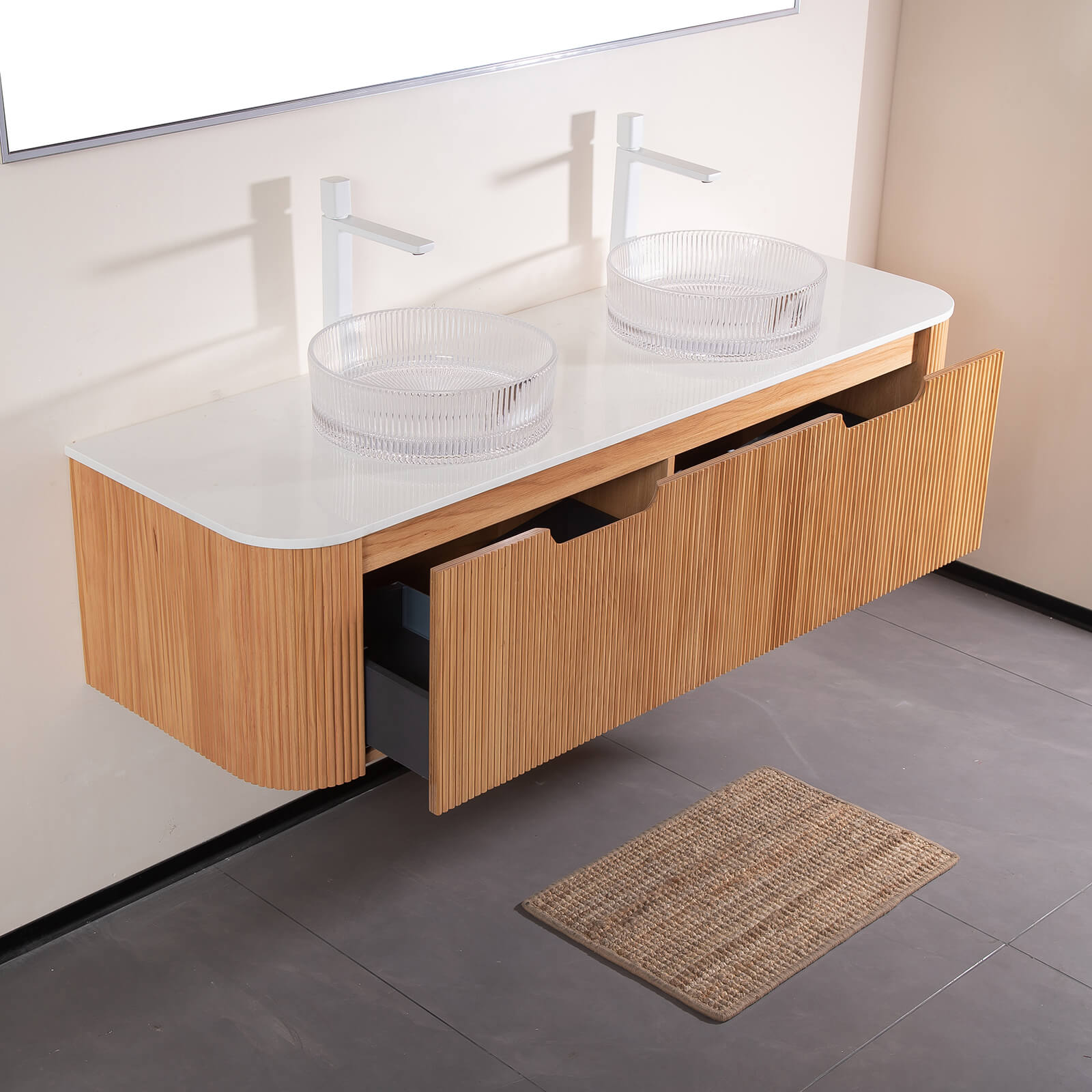 modern bathroom vanity with dual round clear glass sinks