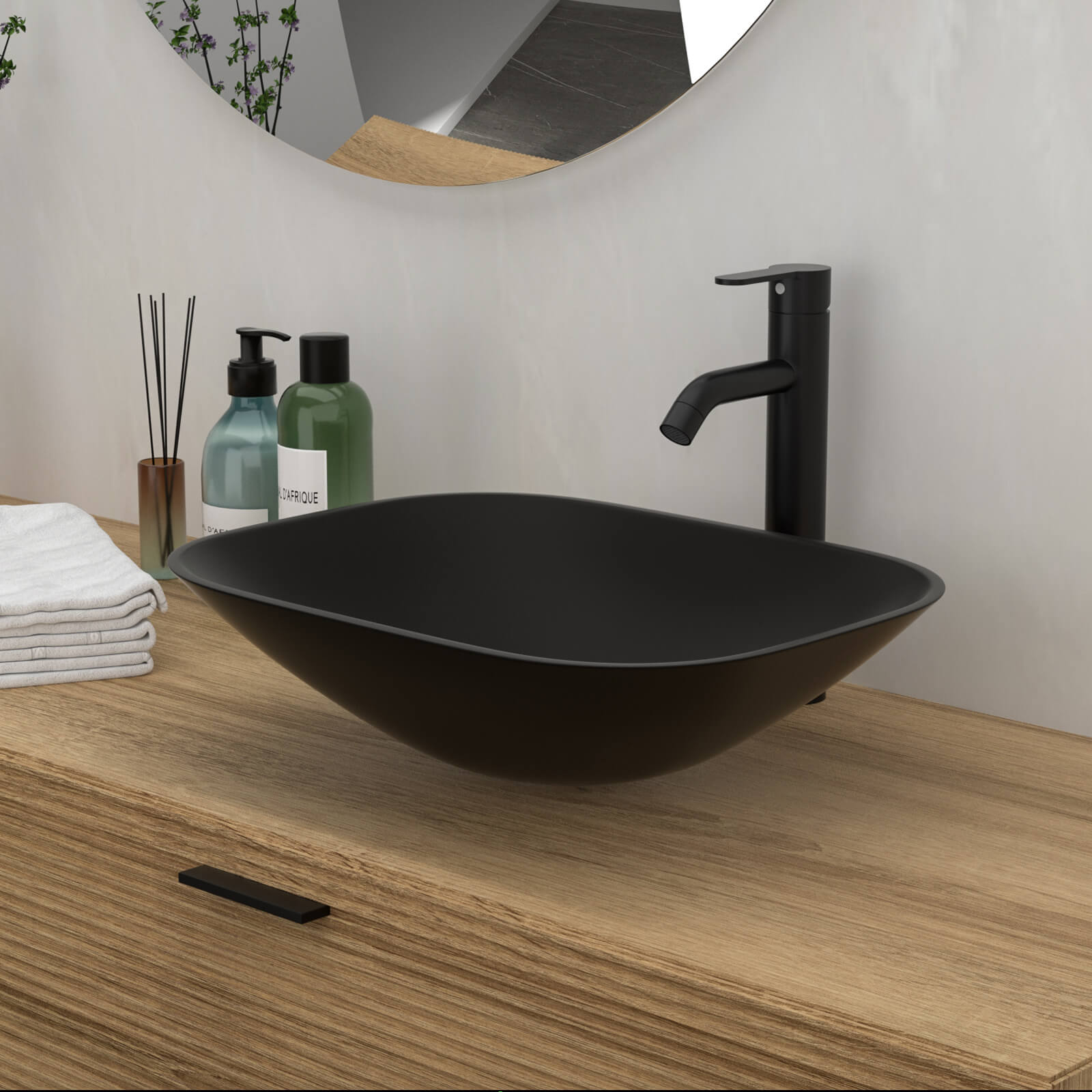 modern black glass sink and matte black single handle faucet
