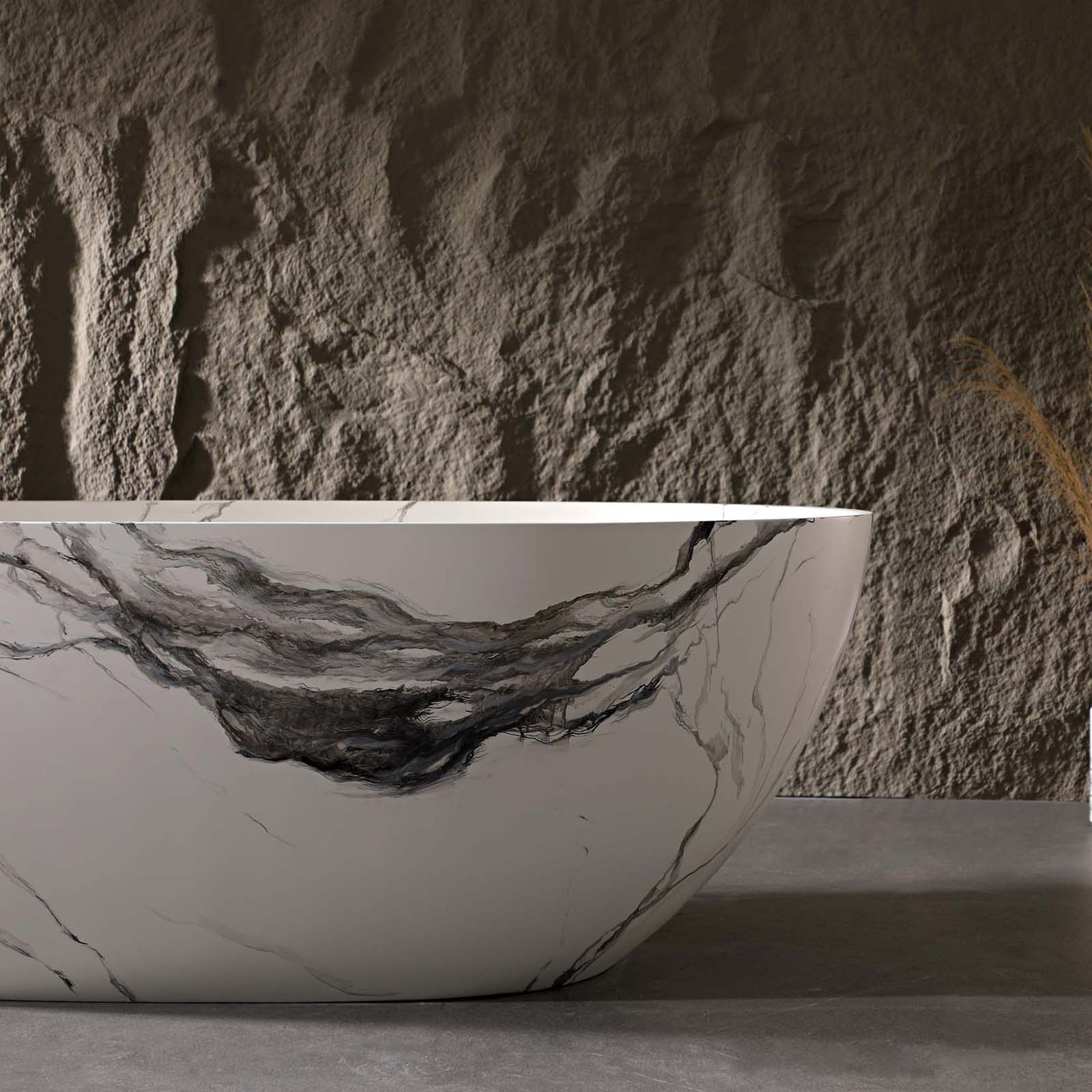 solid surface freestanding tub with black and white brushstroke patterns