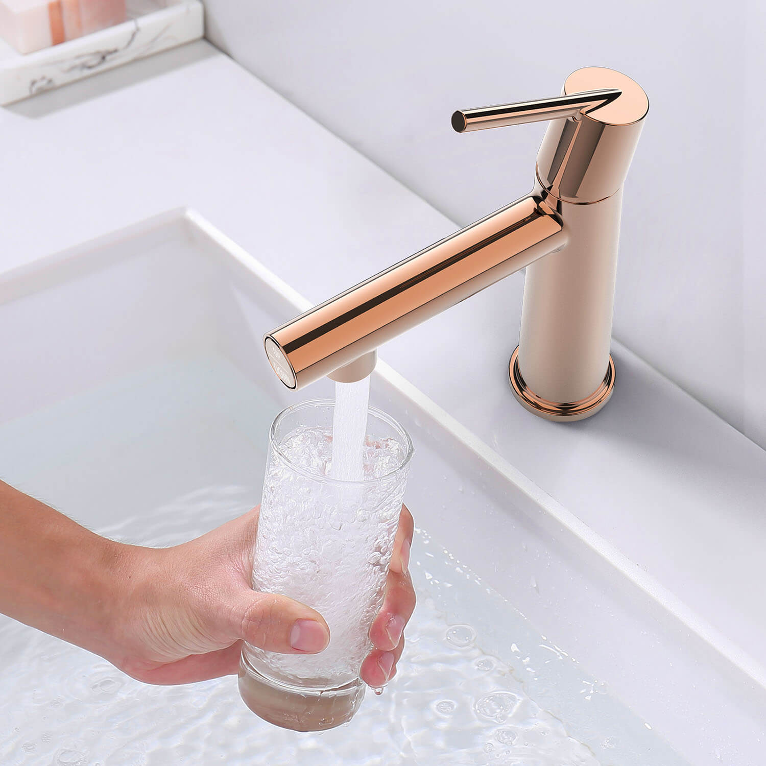 take a bottle of water from Rose Gold Single Handle Single Hole Bathroom Faucet