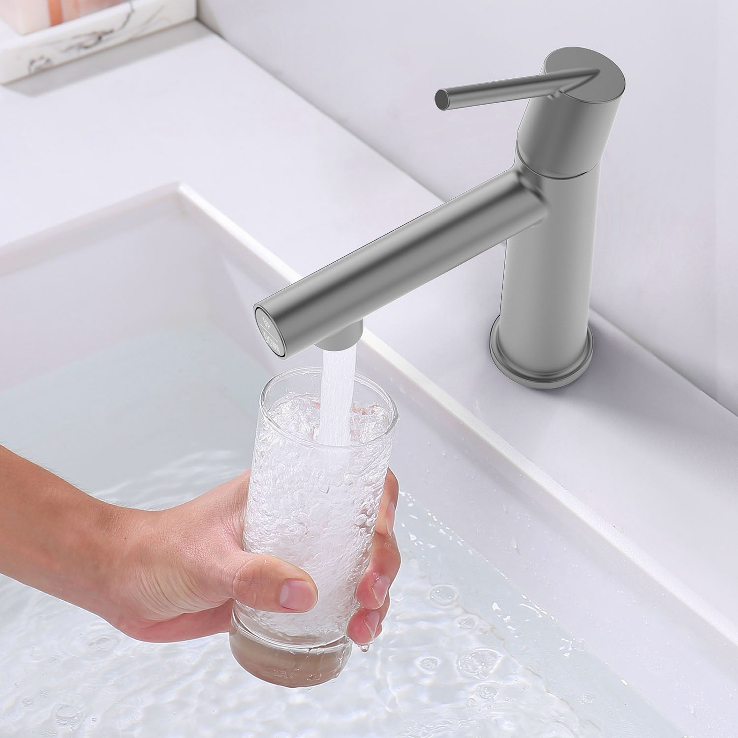 take a glass of water from Gray Bathroom sink Faucet