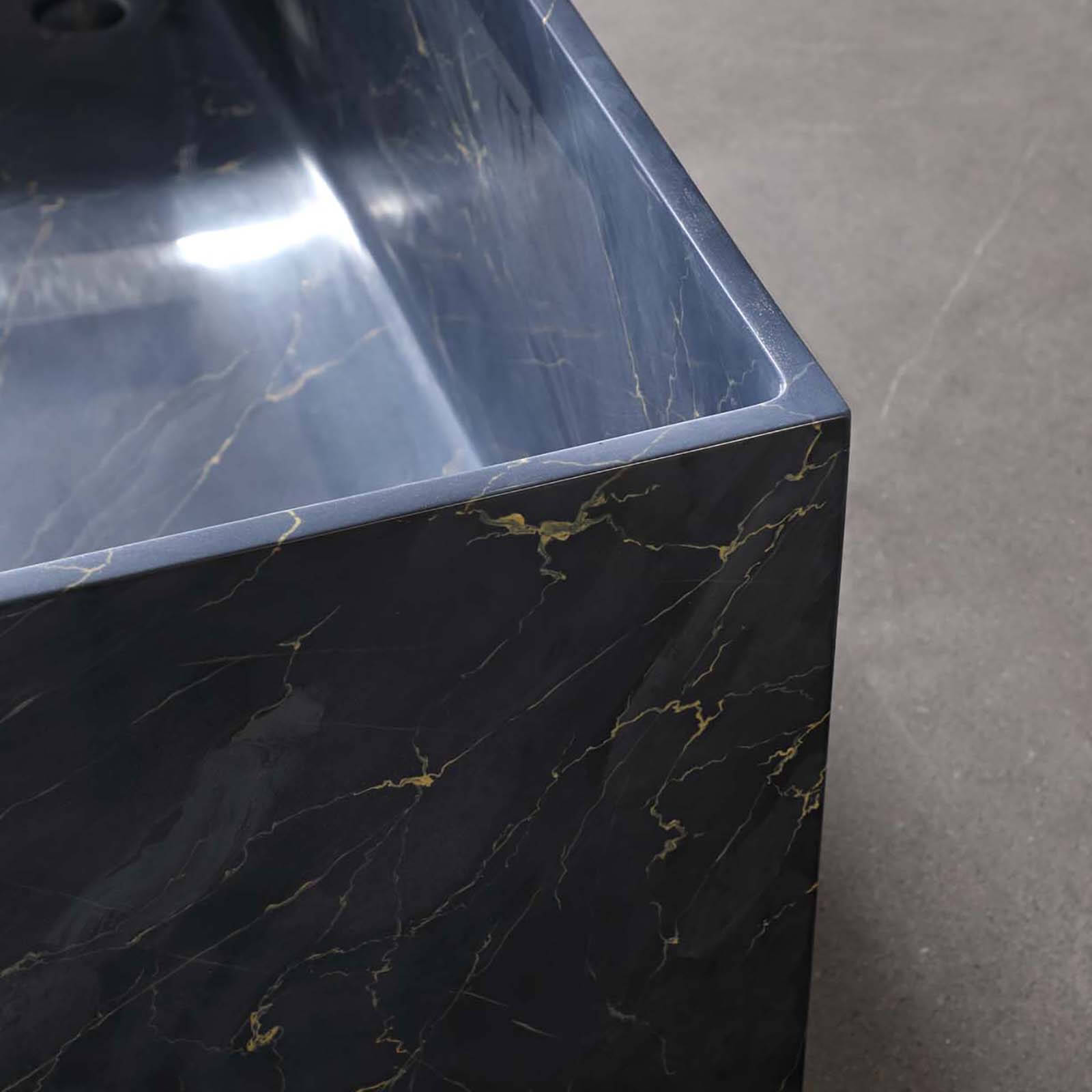 unique freestanding bathtub featuring deep blue and gold pattern