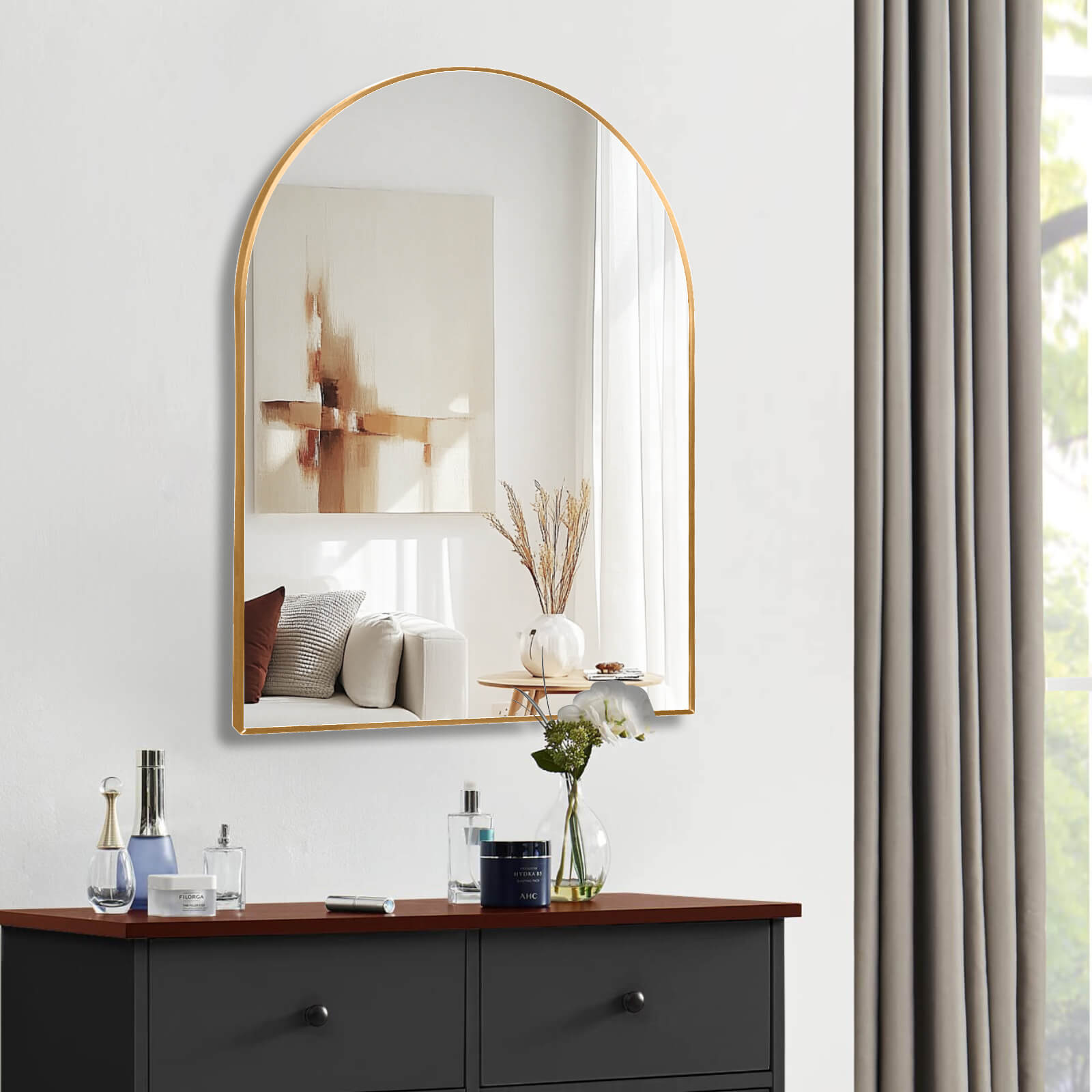warm gold mirror reflecting bathroom light