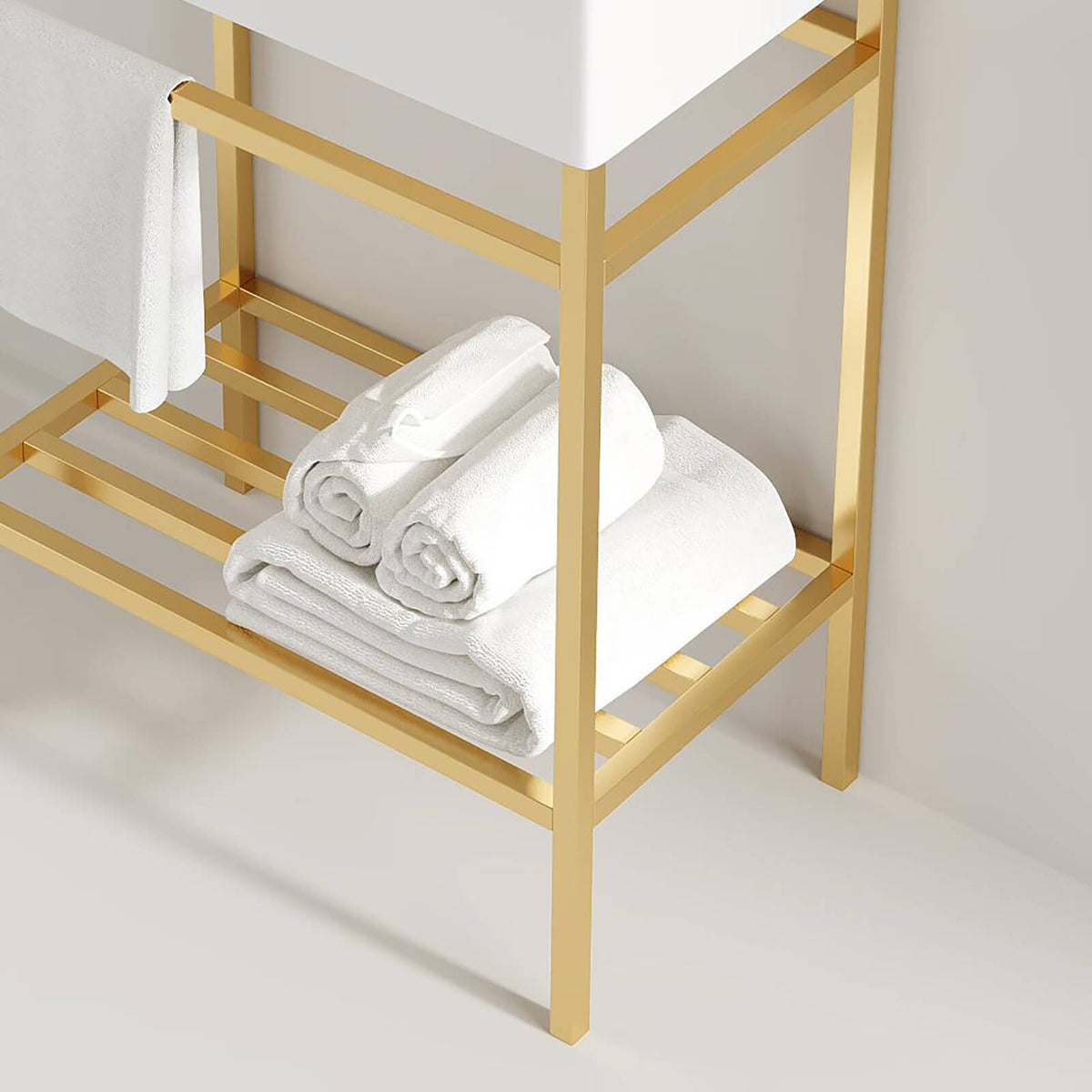 white ceramic sink with gold metal frame