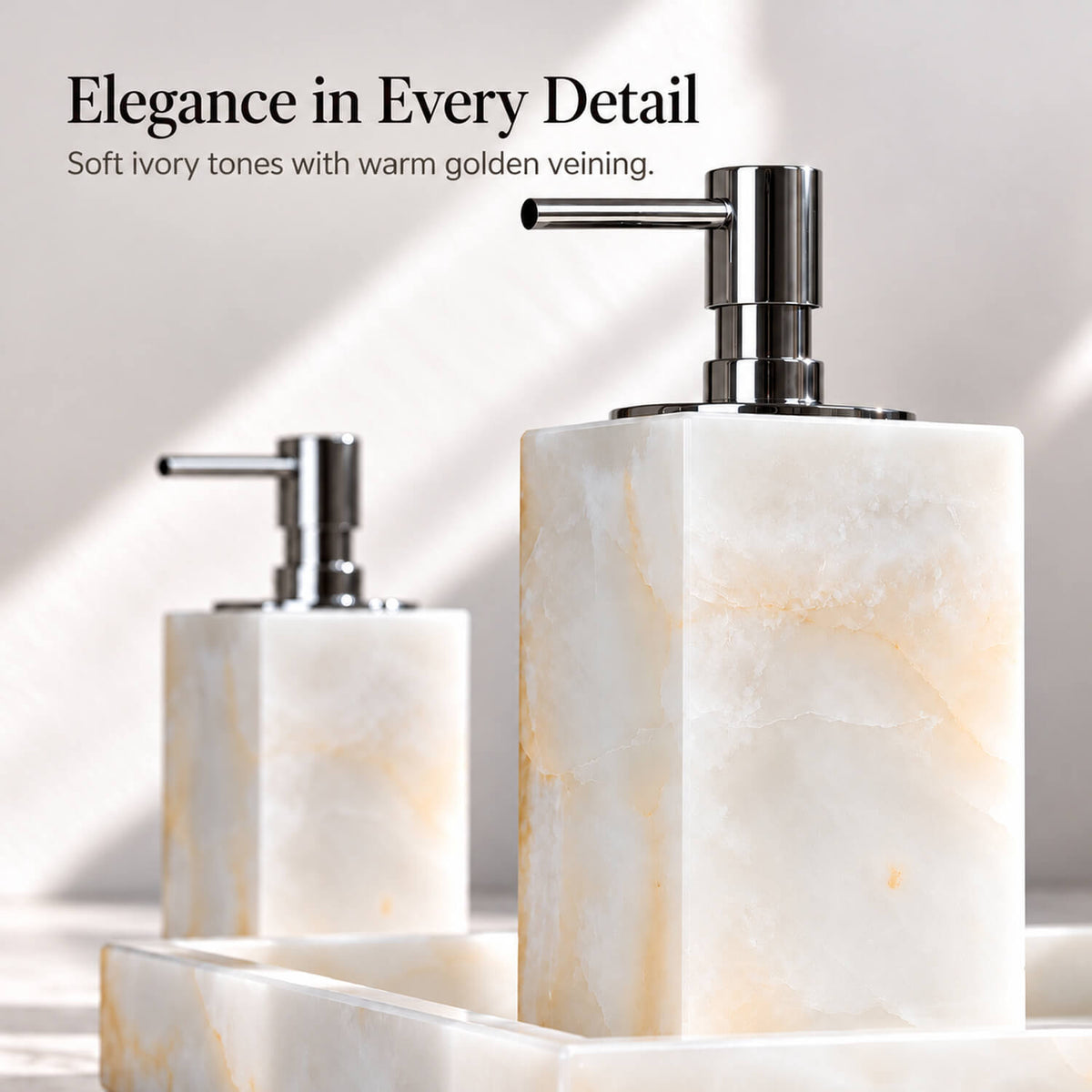 White jade marble soap dispenser with chrome pump and warm golden veining, close-up