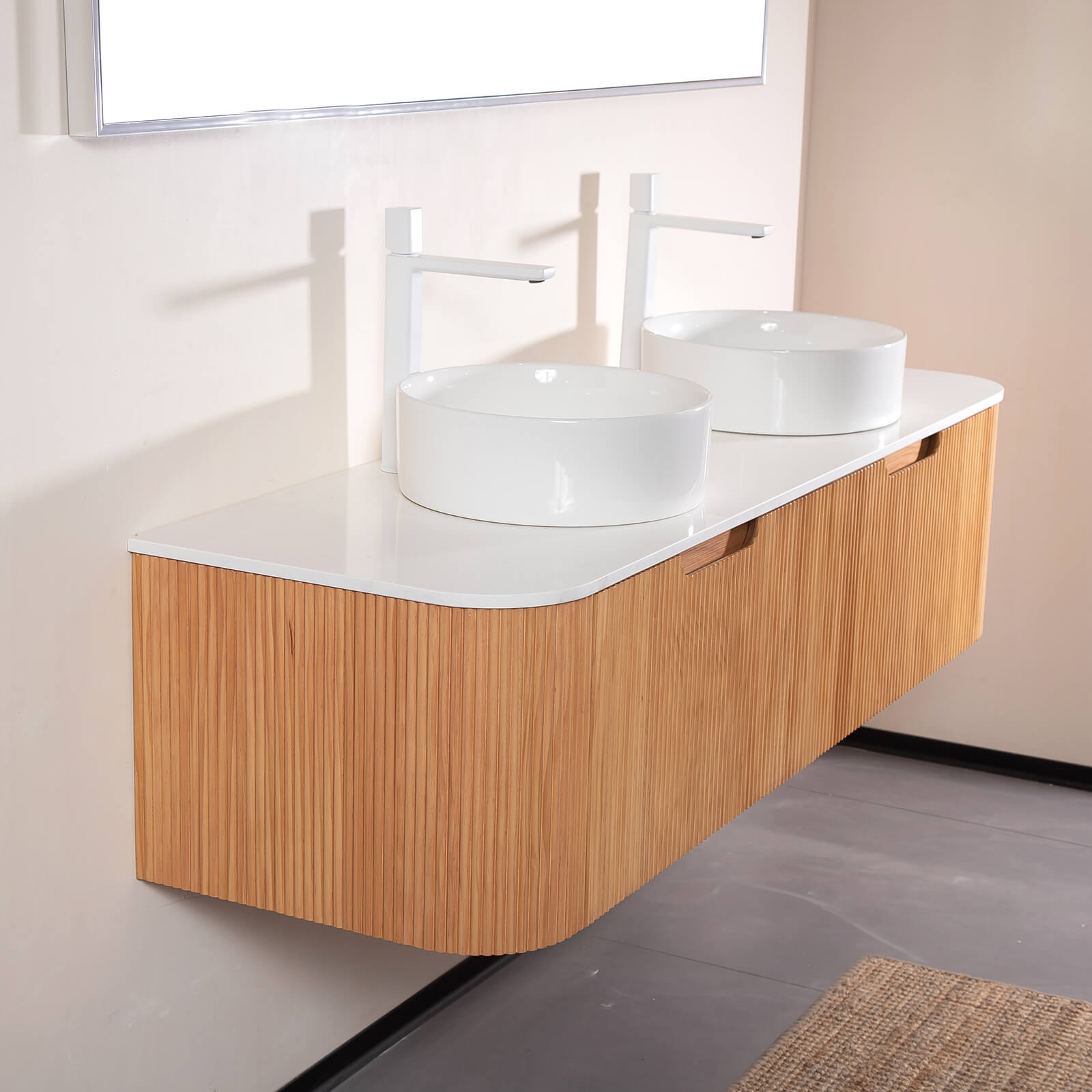 white oak vanity with double ceramic vessel sinks