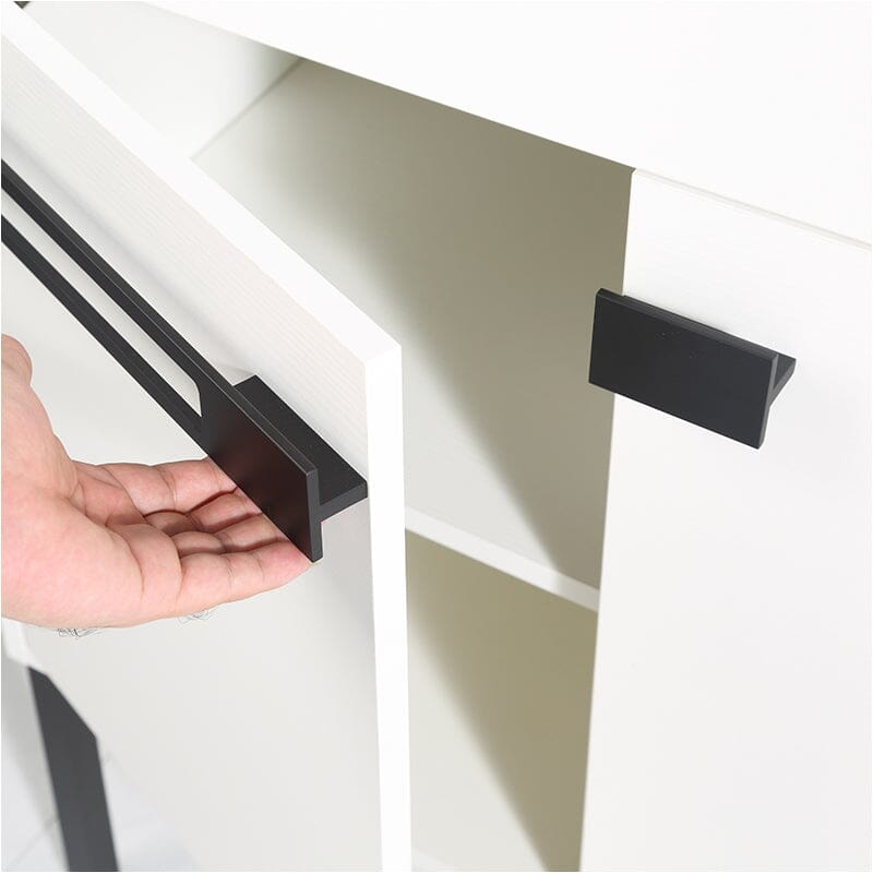 Detail of white freestanding plywood bathroom vanity with doors