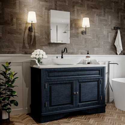 16 x 24-inch mirrored medicine cabinet above a blue bathroom vanity.