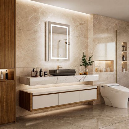 Angled bathroom view of a 24 x 36-inch left single-door LED medicine cabinet with mirror above a floating vanity beside a bathtub.
