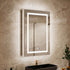 Close-up bathroom view of a 24 x 36-inch left single-door LED medicine cabinet with mirror with illuminated mirror edges above a black vessel sink.