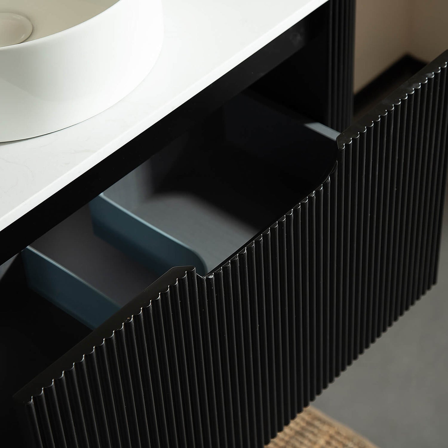 36 black bathroom vanity with U shaped drawers and French vertical grooves in