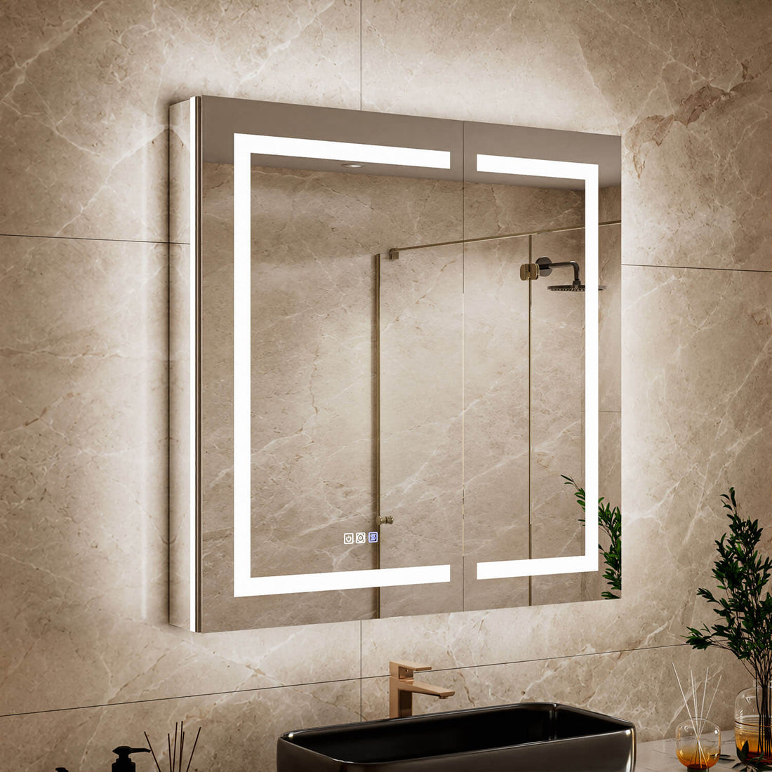 Close-up bathroom view of a 36 x 36-inch double-door LED medicine cabinet with mirror with illuminated mirror edges above a black vessel sink.