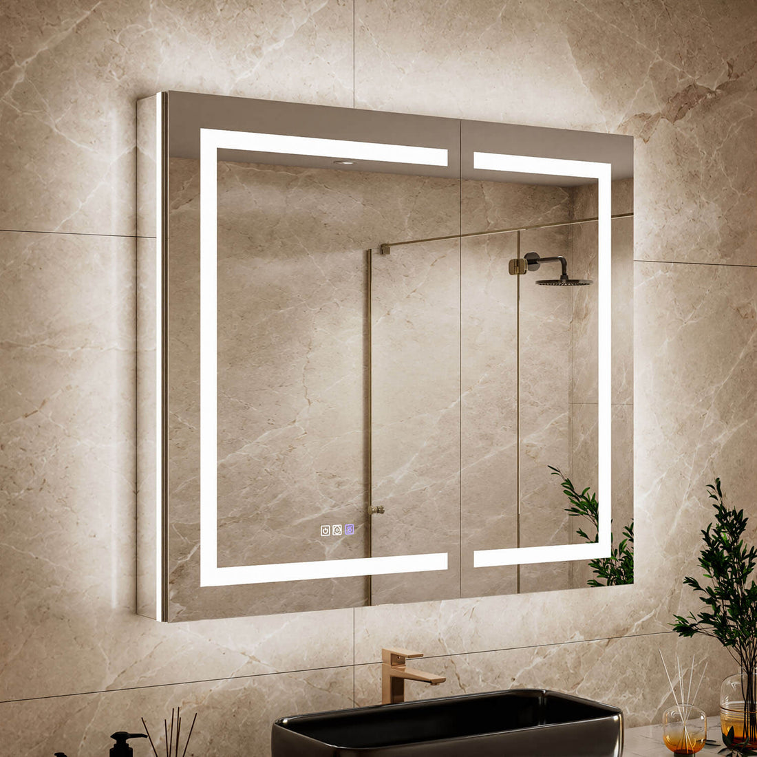 Close-up bathroom view of a 42 x 36-inch double-door LED medicine cabinet with mirror with illuminated mirror edges above a black vessel sink.