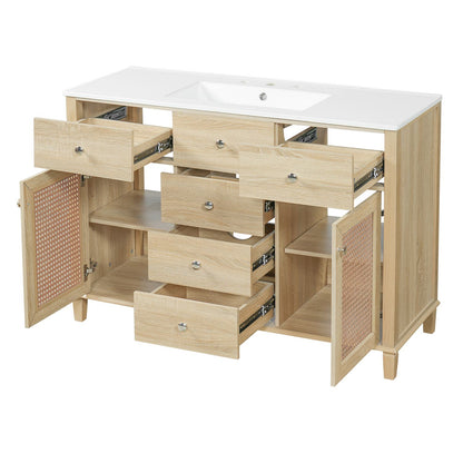 48 inch natural oak rattan bathroom vanity 3 quarter angle view with open drawers and doors on white background
