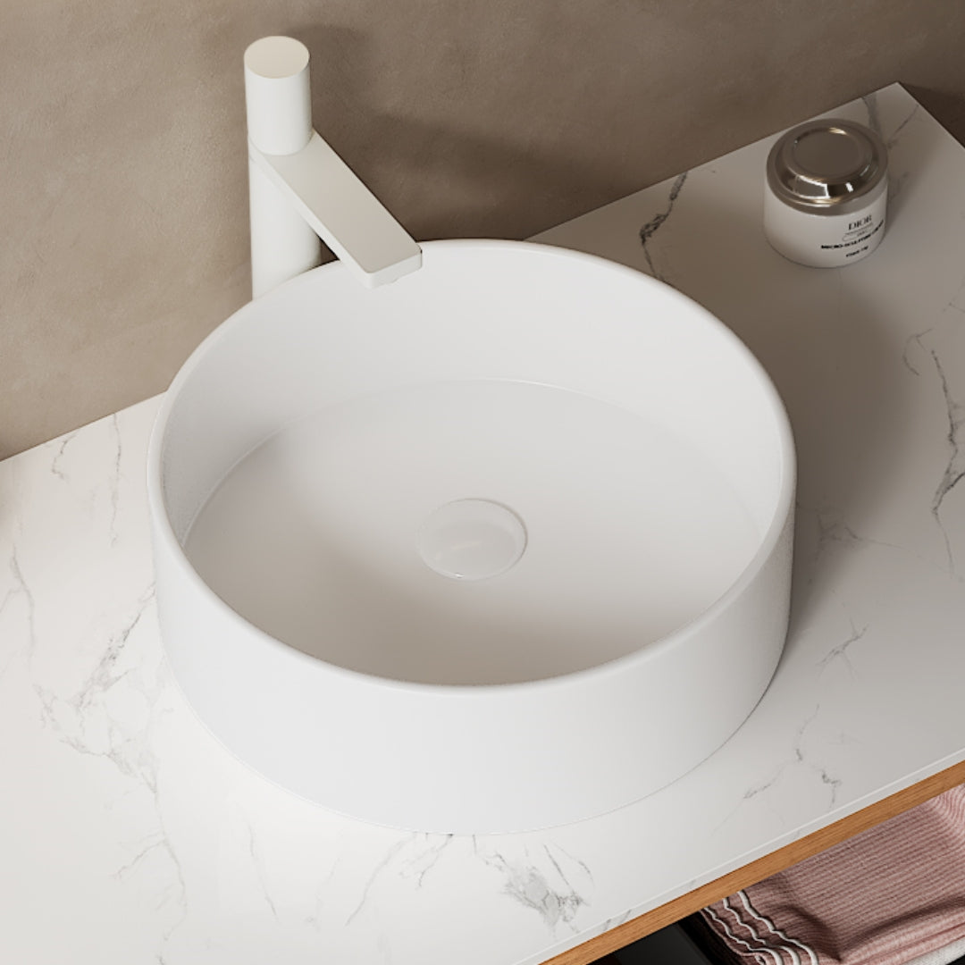 Round White Ceramic Above-Counter Vessel Bathroom Sink side oblique view smooth white cylindrical design