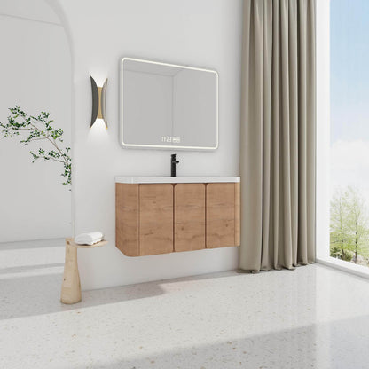 A modern wall-mounted vanity with a White Resin Sink and LED mirror.