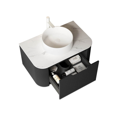 Black single sink vanity with modern fluted panel design