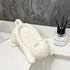 Cat-shaped ceramic soap dish with self-draining grooves