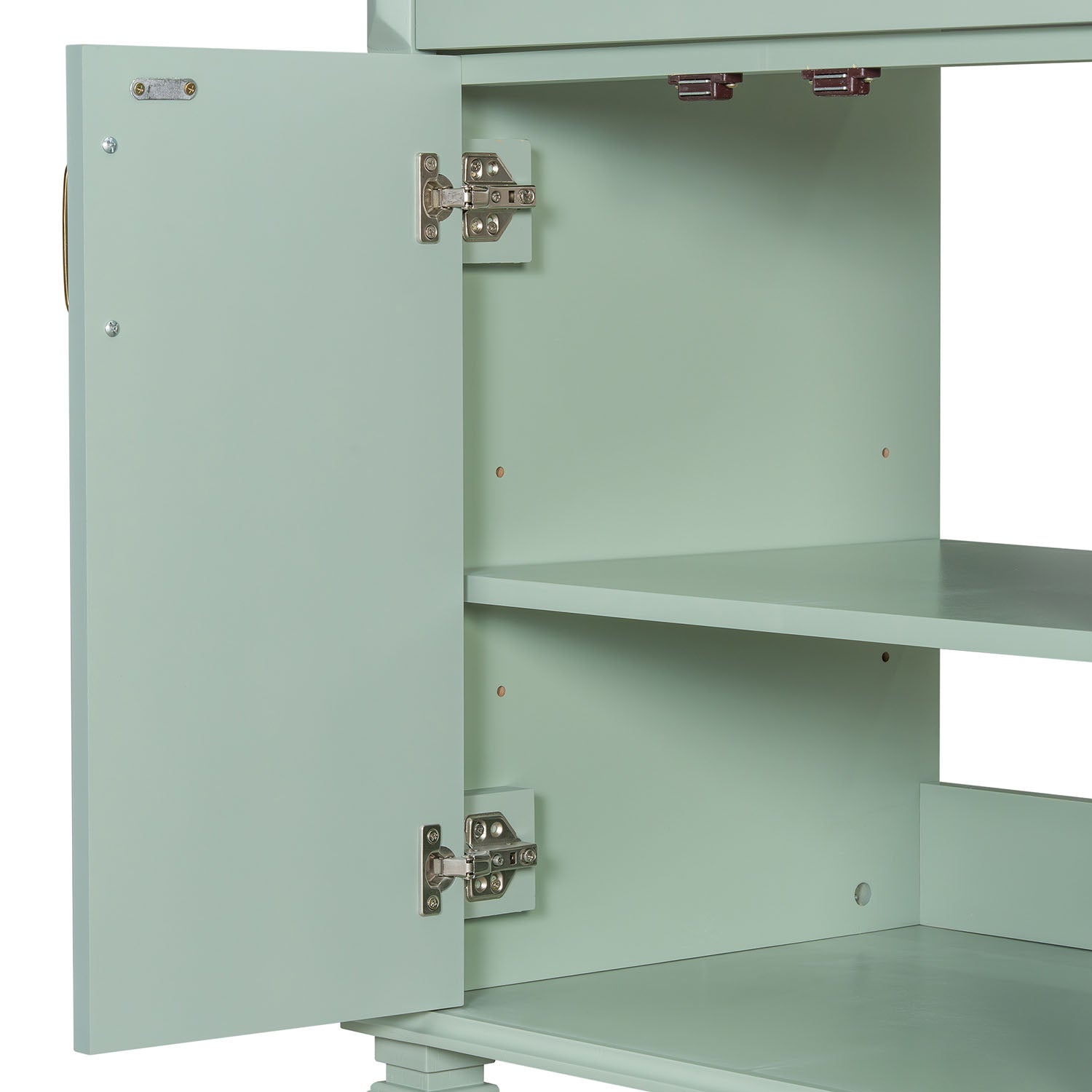 Close-up detail of metal hinges on green bathroom vanity cabinet