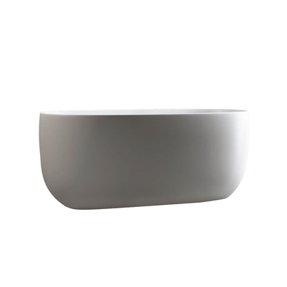 Compact oval soaking tub with smooth_ hand polished stone resin surface